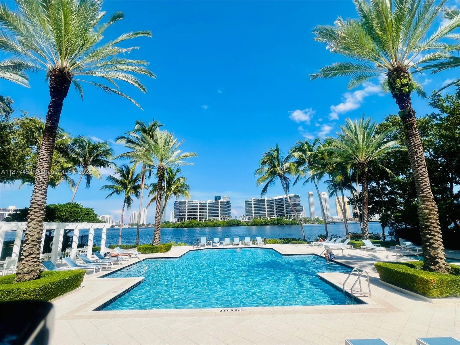 Spacious and freshly painted 2-bedroom, 2-bathroom unit featuring a large balcony accessible from both the main bedroom and living room. The assigned covered parking space is conveniently located on the same floor as the unit, a rare and valuable feature. Enjoy resort-style living with luxurious community amenities, including a stunning swimming pool, fitness center, tennis courts, party room, and more. Ideally located just 5 minutes from Aventura Mall, dining, and entertainment.
