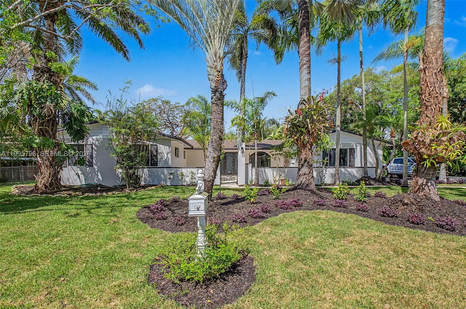 Fantastic, newly remodeled 4 bdrm, 2.5 bath home in Palmetto Bay. New shingle roof, PVC plumbing, electrical, impact windows/doors, sprinkler system! Lovely terrace entry. Open concept living area with formal living/ dining and separate family room off the kitchen. New plank tile flooring. Light and bright kitchen features center island with counter seating, white cabinetry, quartz countertops and pantry. Indoor laundry room. Nicely sized bedrooms, new baths. Primary suite has walk in closet with built-in cabinetry. Fenced backyard with marble patio and room for a pool. 2 car garage with side entry.