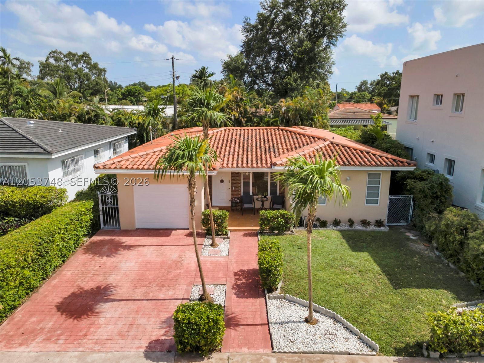 A standout Coral Gables opportunity offering timeless charm, strong curb appeal, and an unbeatable City Beautiful location. Actual living area is 2,005 sq ft, with seller permit available to confirm. This well-maintained home features tile flooring throughout, spacious living and dining areas, a comfortable kitchen, generous bedrooms, a 1 car garage, and a private outdoor patio ideal for relaxing or entertaining. Enjoy classic Coral Gables character with a welcoming front entry, paver driveway, Spanish style roofline, and lush tropical landscaping. Prime location near Miracle Mile, Giralda Plaza, Granada Golf Course, The Biltmore, Shops at Merrick Park, dining, shopping, parks, schools, and major roadways. Excellent opportunity to own in one of Miami’s most desirable communities, known for its tree lined streets, historic charm, walkability, and long-term value.
