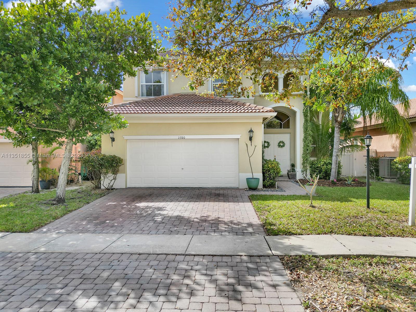 Resort living in Portofino Lakes, located inside the gated Community of Waterstone. Natural light encompasses this impressive & tastefully updated 5bed/3bath single family home w/2-car garage. Property features volume ceilings, formal dining & living room w/one of the bedrooms conveniently located on the ground floor. Eat-in kitchen is wide open to the grandiose family room ideal for entertaining your guests and family. It boasts granite counter tops, solid wood cabinetry & stainless steel appliances. Master suite includes an ensuite bath with roman tub, walk-in closet and a large sitting area. Property also features storm protection, interior laundry room with sink & sauna. Relax and entertain in the Waterstone Grand Clubhouse where you can enjoy your gym, swimming pools & playground.