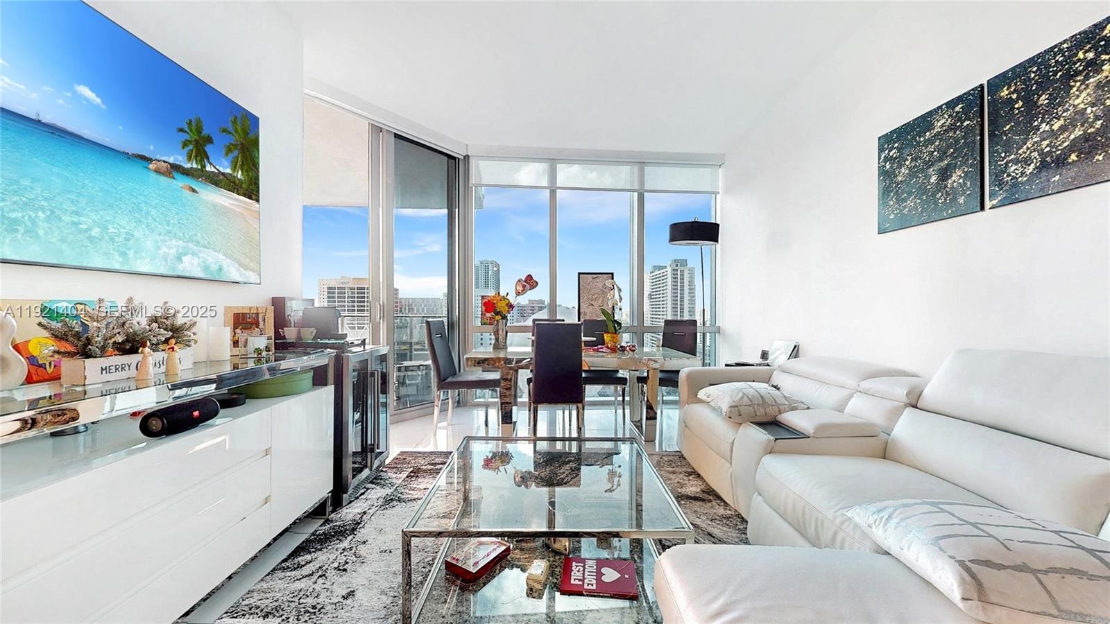 Experience luxury living at its finest in this "Jewel at Paramount." This stunning residence features en-suite privacy, floor-to-ceiling windows, and a spacious balcony with breathtaking city views. The gourmet kitchen is equipped with state-of-the-art appliances, quartz countertops, and custom cabinetry. Beyond the unit, residents enjoy the building's world-renowned amenities, which are unlike anything else in the city. The comprehensive package includes a rooftop pool and sundeck, a full-service spa, and a fitness center with yoga and boxing studios. Unique sporting facilities feature a soccer field, tennis and basketball courts, and a golf simulator. With a movie theater and 24/7 concierge/security, this is a truly world-class living experience.