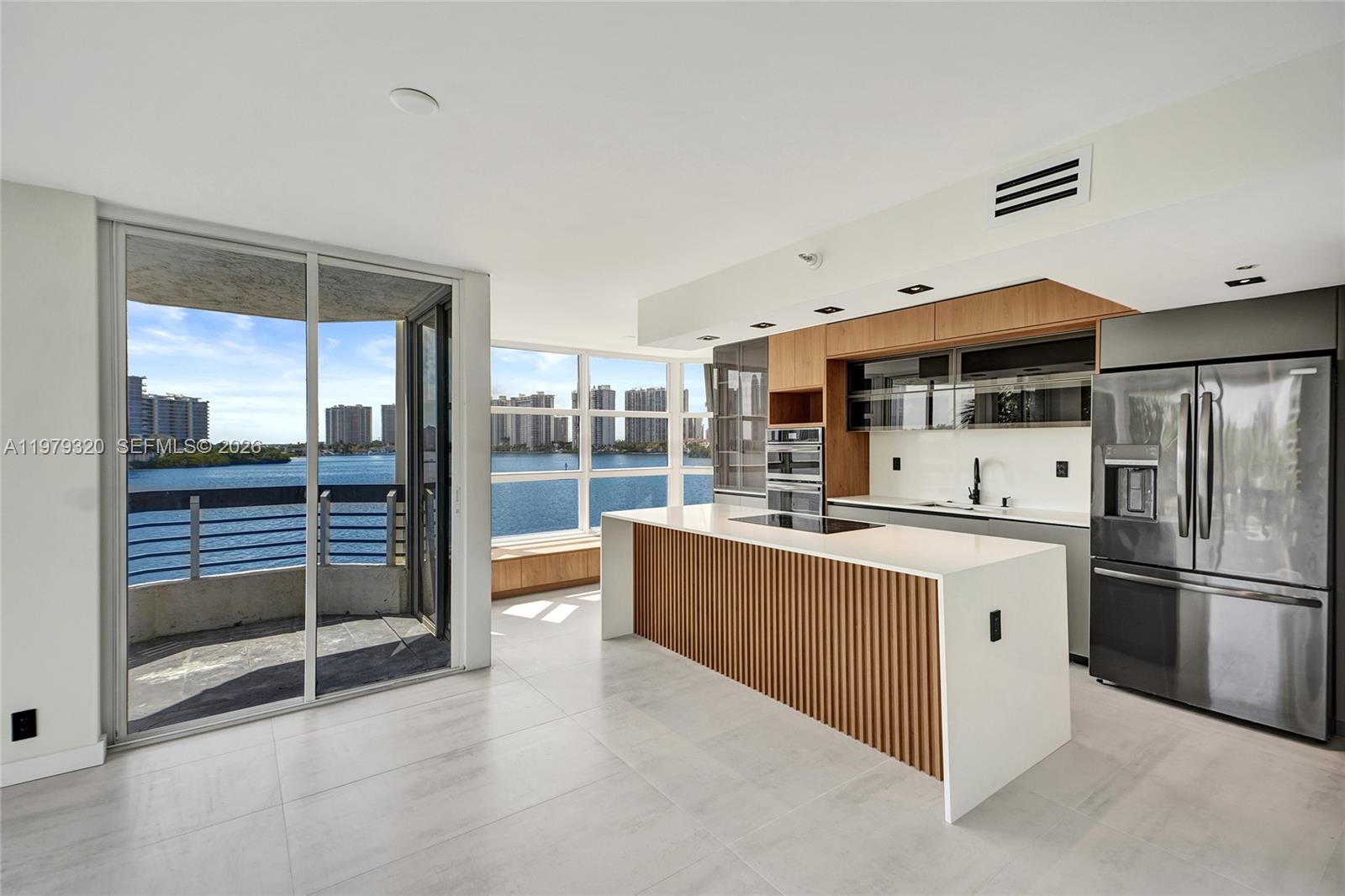 Spectacular residence at Mystic Pointe offering what is currently the most modern and best located unit in the building. This fully redesigned 3-bedroom, 3-bath residence features an open kitchen and an elegant layout designed by a well-known designer, combining sophistication with comfort and exclusivity. The unit offers breathtaking water views from every room and the highly sought-after “cruise view,” where the water sits so close to the building that boats pass by just feet away, creating the unique sensation of being on a luxury cruise.

Mystic Pointe offers resort-style amenities including tennis courts, a sun-filled pool with all-day sunlight, an impressive three-story fitness center, sauna, Turkish baths, massage rooms, and a top-tier marina. Residents also enjoy a scenic waterfront walking path along the Intracoastal, plus exclusive restaurants, shops, and convenience stores within the community, creating a true lifestyle destination in the heart of Aventura.