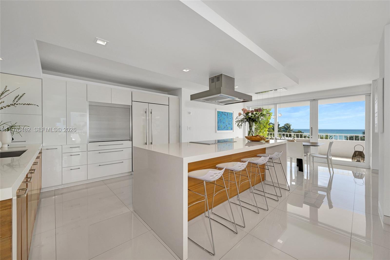 Expansive 4-bedroom, 3.5-bathroom residence combining Units 401 and 403, offering 2,825 sq ft of beautifully remodeled living space. This bright and airy home features spacious open-concept living and dining areas, elegant tile flooring throughout, and floor-to-ceiling windows showcasing stunning ocean views. A wraparound balcony extends from the main living areas, creating seamless indoor-outdoor living, perfect for relaxing or entertaining. The thoughtfully designed layout offers both privacy and functionality, ideal for those seeking generous oceanfront living. Includes two assigned parking spaces.
The building offers direct beach access, 24-hour security and concierge services, a social room, and high-speed Wi-Fi throughout all common areas. Residents enjoy a heated swimming pool (one per building), three lighted tennis courts, a fully equipped fitness center with sauna, car wash area, and full beach service.