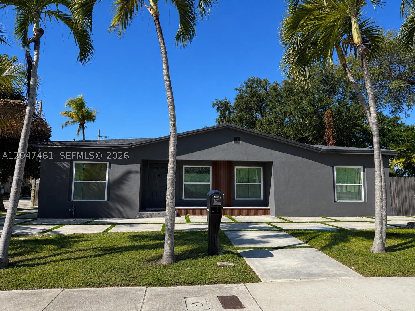 Exceptional corner-lot property offering outstanding flexibility, strong income-producing potential, and excellent future development opportunities in one of Miami’s most convenient locations.
One of this property’s greatest advantages is its zoning. According to public records, it is designated as PA (Primary Zone) – Duplexes General, with a Primary Land Use classification of Multifamily (2–9 Units), providing exceptional flexibility and strong potential for future expansion, or additional income opportunities. This move-in-ready residence features 3/2 renovated, plus a private 1-bedroom, 1-bath efficiency with separate entrance, making it ideal for extended family, guests, a home office, or rental income. Recent upgrades include porcelain tile flooring throughout, a modern kitchen with stainless steel appliances, renovated bathrooms, updated electrical, contemporary lighting, new fencing, window blinds, and a storage shed for additional storage. Conveniently located just minutes from major highways, Wynwood, the Design District, Midtown Miami, and Downtown Miami, this property offers easy access to shopping, dining, entertainment, schools, and everyday conveniences. Whether you’re looking for a primary residence, a multi-generational home, or an investment property, this unique property offers exceptional flexibility, functionality, and long-term value. Buyers are encouraged to verify zoning, land use, and permitted uses with the appropriate municipal authorities.