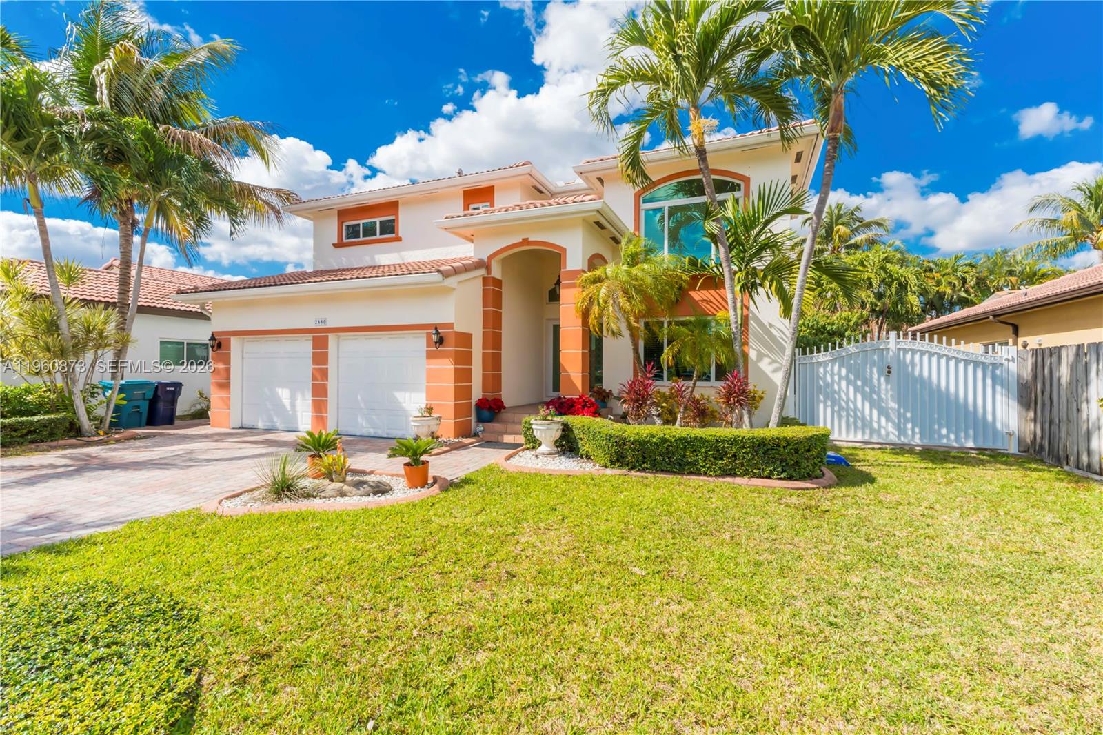 Beautifully maintained two-story Spanish Galicia model with 4 bedrooms and 3 full bathrooms, including two master suites (one on the first floor with separate entry). Features include impact windows/doors, modern windstorm-resistant construction, Ethernet-wired rooms, open kitchen with granite and stainless steel appliances, bay-window breakfast nook, and high ceilings. A reversible garage conversion adds a private in-law suite with its own bedroom, bathroom, and separate entry, plus an additional living room created from the converted bay. Large covered patio with built-in speakers, fully paved backyard with fruit trees, and oversized side yard for RV/Boat. Total parking capacity approx. 8–10 vehicles. Prime inland location minutes from FIU, top hospitals, beaches, marinas, casinos, major dining/shopping, the Youth Fairgrounds, and the new Miami Freedom Park soccer stadium. Quick access to downtown, Brickell, Coral Gables, South Beach, and Miami International Airport (without flight-path noise). Naturally higher finished-floor elevation adds to the home’s appeal.