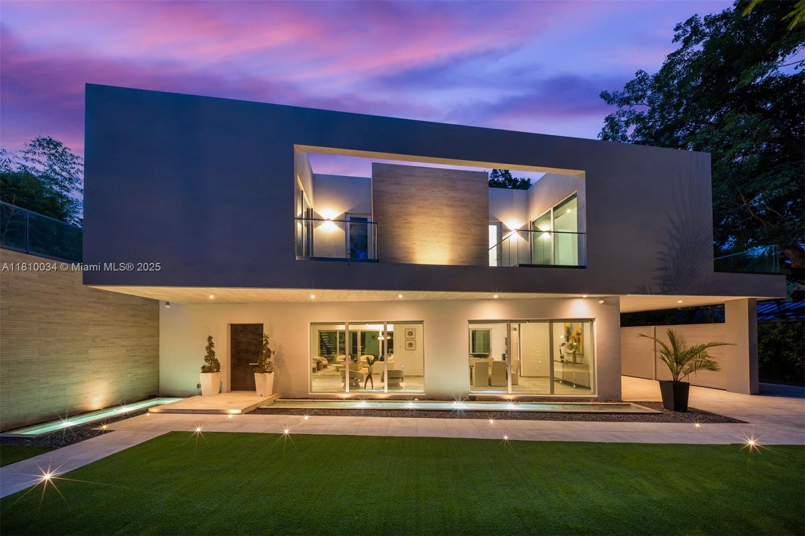 Experience modern luxury with clean architectural lines, soaring ceilings, and abundant natural light in the heart of Coconut Grove. Built in 2018, this stunning 5-bedroom, 6-bathroom residence sits on a large 10,947 SF lot and offers 4,432 SF of beautifully designed living space. The expansive layout features spacious en-suite bedrooms, a sleek chef’s kitchen, and seamless indoor-outdoor flow, perfect for entertaining. Ideally located near top-rated schools, parks, marinas, and the vibrant dining, shopping, and cultural offerings of downtown Coconut Grove, this home combines comfort, style, and prime location in one exceptional package.