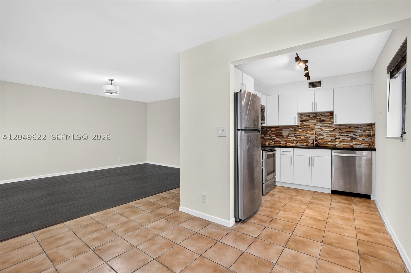 TAMARAC GARDENS CONDOMINI - Residential Lease