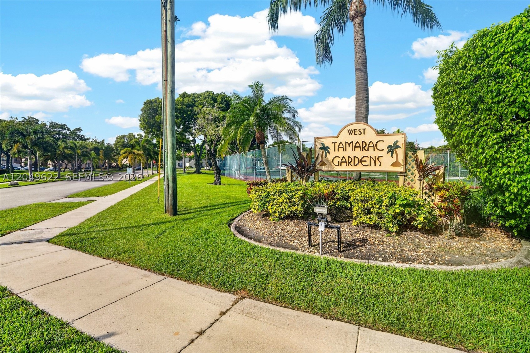 TAMARAC GARDENS CONDOMINI - Residential Lease