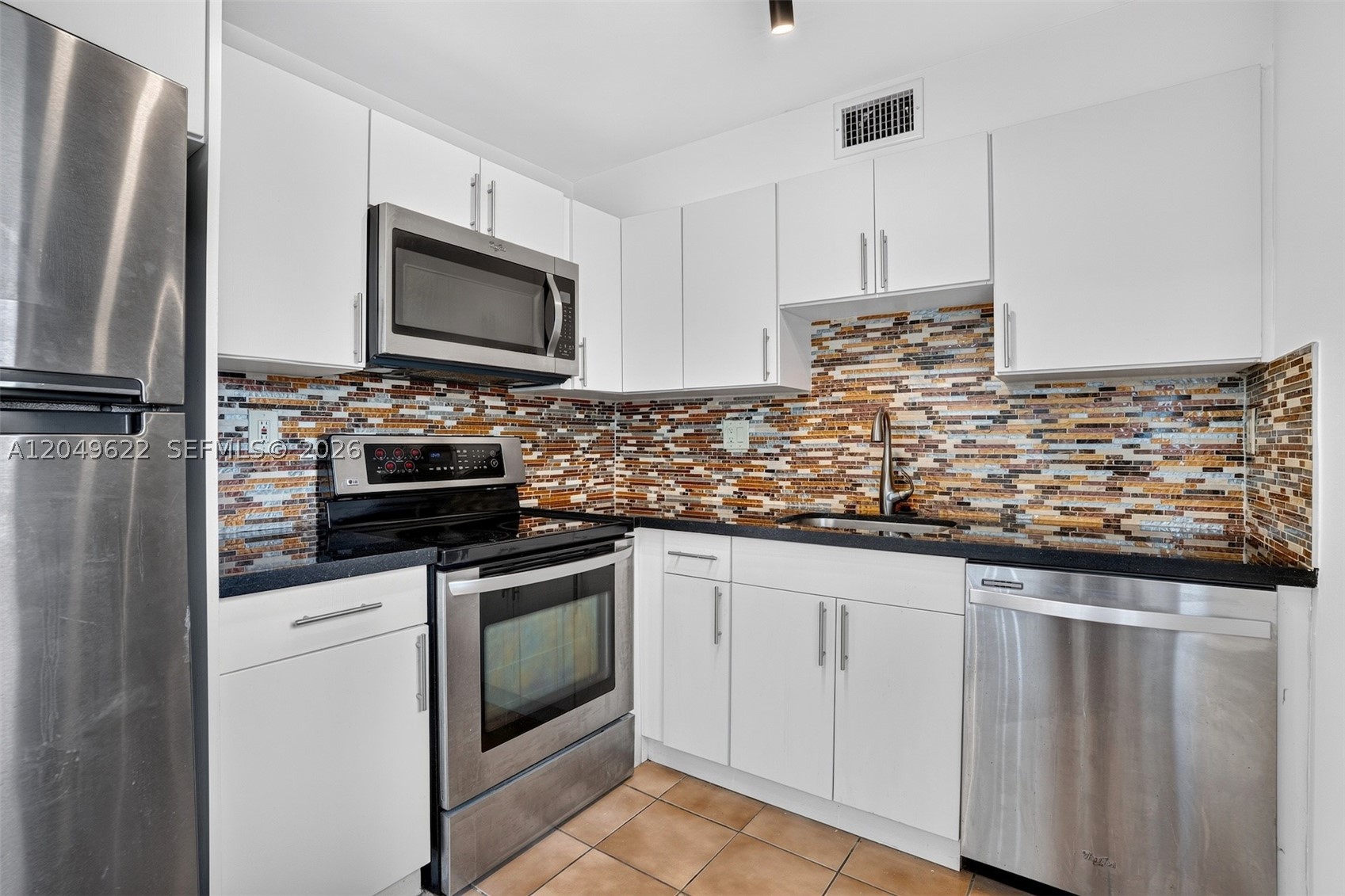 TAMARAC GARDENS CONDOMINI - Residential Lease