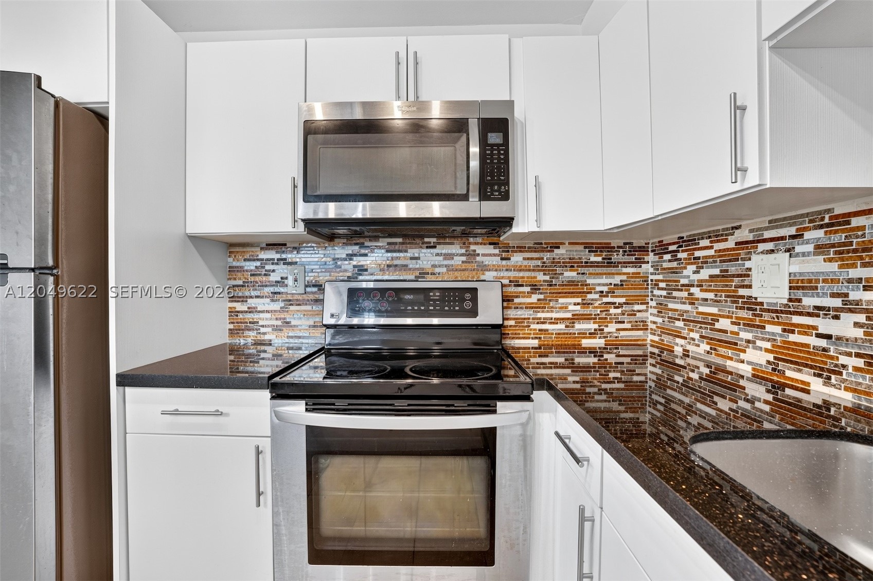 TAMARAC GARDENS CONDOMINI - Residential Lease