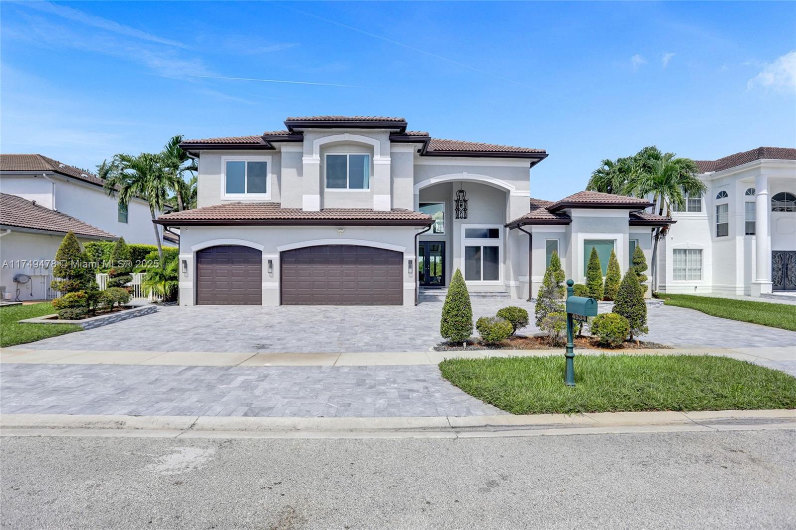 This exquisite 5-bedroom, 4-bathroom home boasts 4,512 square feet of luxurious living space and showcases meticulous renovations, including 48x48 porcelain tile, a spectacular custom kitchen equipped with top-of-the-line Dacor appliances, striking stone countertops, and sleek Italian cabinetry. The master bathroom is a serene retreat, featuring a Dual Wall-Mount Rainfall Shower and a Modern Smart Floor Mount Elongated Automatic Smart Bidet Toilet Seat. This smart home also features an Intelligent Motion Sensor LED Stairs, custom-made closets, and a picturesque pool that overlooks a tranquil canal in the prestigious Sunset Lakes community of West Miramar. Enjoy breathtaking sunsets and unparalleled upgrades in Miramar's finest community.