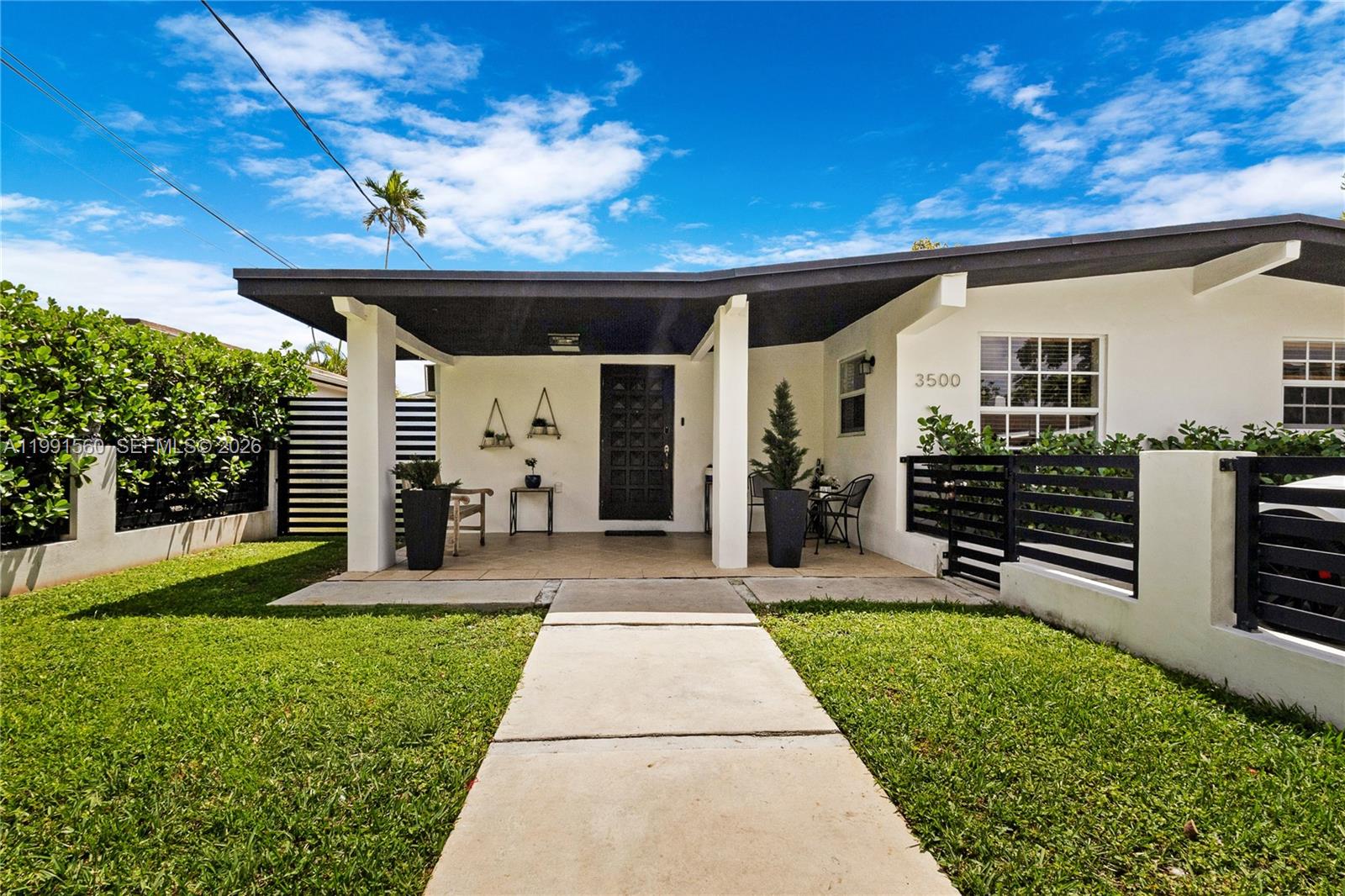 WELCOME to the Eugenia Groves Park neighborhood located less than two blocks from Coral Gables. This charming 3 Bedroom 2 Bathroom home is ready to move into! Newer 2 Car Driveway already setup with EV/Tesla charger. Large yard ideal for relaxing & entertaining. Roof is from 2020, lovely kitchen/dining layout perfect for family dinners, covered terrace, separate laundry & still plenty of space in backyard! Home features ENORMOUS primary bedroom with walk-in closet & massive shower! Second Bedroom also has walk in closet. Zoned elementary school is Coral Gables Preparatory K-8, Ponce Middle School & Coral Gables High School. NO HOA!!