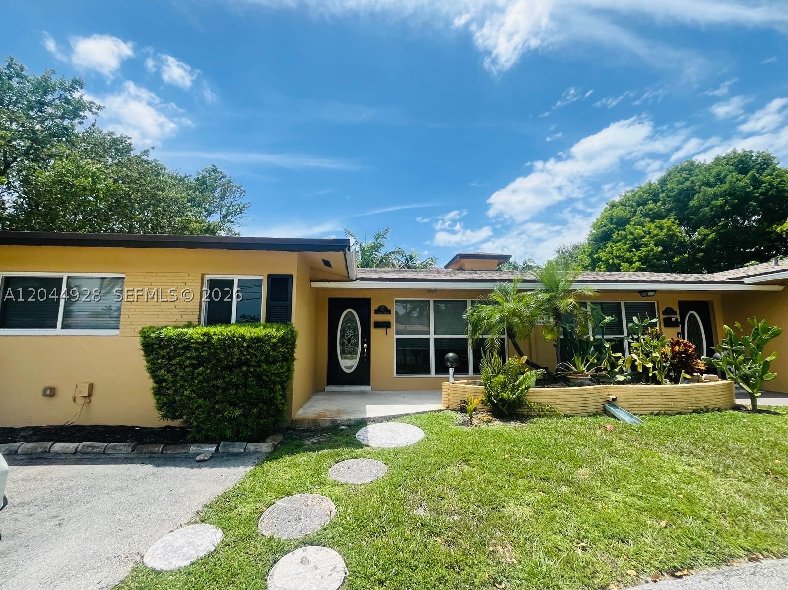 Welcome to this 2-bedroom, 2-bathroom home for rent  in Pompano Beach. Offering a comfortable layout in a highly desirable location. We are currently putting the finishing touches on the home, including updating the kitchen with brand-new appliances, ensuring it's move-in ready for its next residents. The home also features beautifully renovated bathrooms, classic terrazzo flooring throughout, full impact windows, a screened patio perfect for relaxing, and a separate laundry room for added convenience. The circular driveway provides ample parking, and the home is located less than 2 miles from the beach, with easy access to shopping, dining, and everything vibrant Pompano Beach has to offer. Contact us today for more information or to schedule a showing!