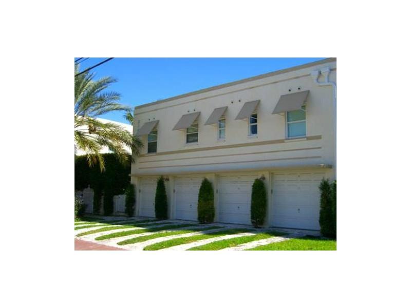Desirable Kim Aimee Condo. Charming 1/1 with Private Garage, nestled in a peaceful tropical setting.  Gated waterfront complex is only 11 Units.  Wood floors, marble baths, designer kitchen w S/S appl., washer/dryer, meticulously maintained grounds w pool , easy 2 show,  A MUST SEE!!