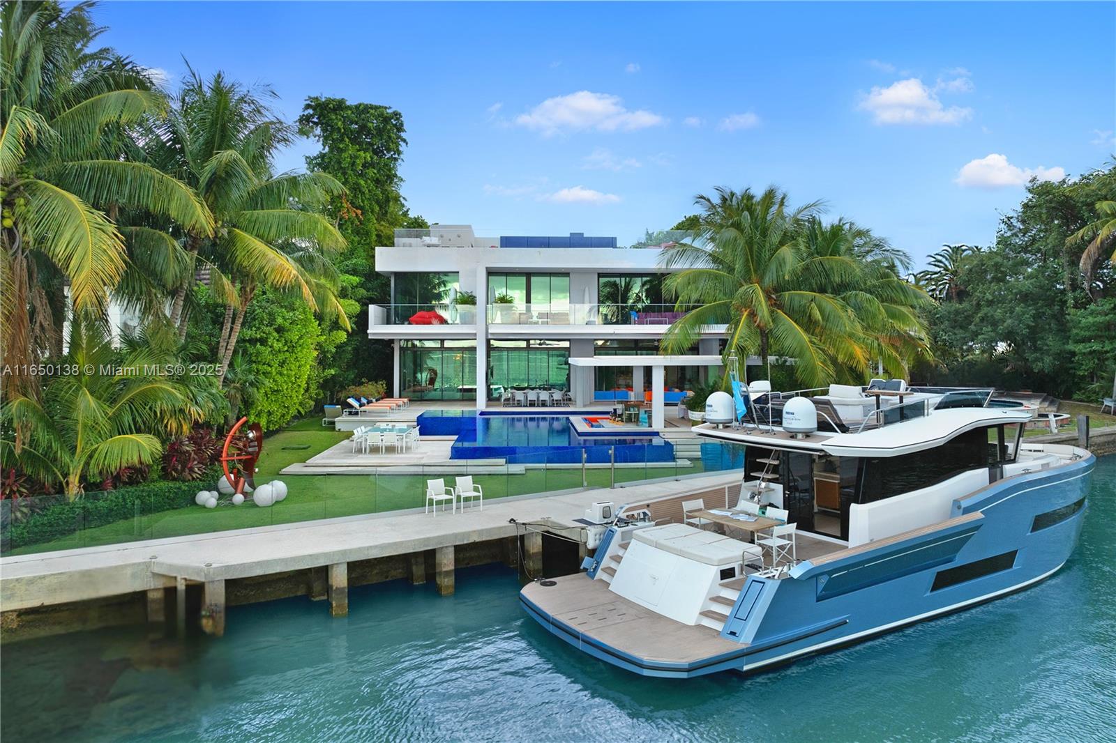 Discover the opportunity to reside on North Bay Road, one of Miami's most exclusive communities. This impressive eight-bedroom home, crafted by Zeb Jarosz, a distinguished architect known for his work with notable figures such as Michael Jordan, Matt Damon, and Dan Marino, exudes a resort-style ambiance. Encompassing nearly 17,000 SF across three levels, the residence has 105 feet of coveted waterfront and uninterrupted views of Biscayne Bay. The bright and spacious interiors, featuring 12-foot-high ceilings on the ground floor and 11-foot-high ceilings on the second floor, to create expansive living spaces. The third floor unveils a unique full-width roof terrace with a second pool, while the home is adorned with exquisite finishes and tailored details. Miami Beach living at its best!