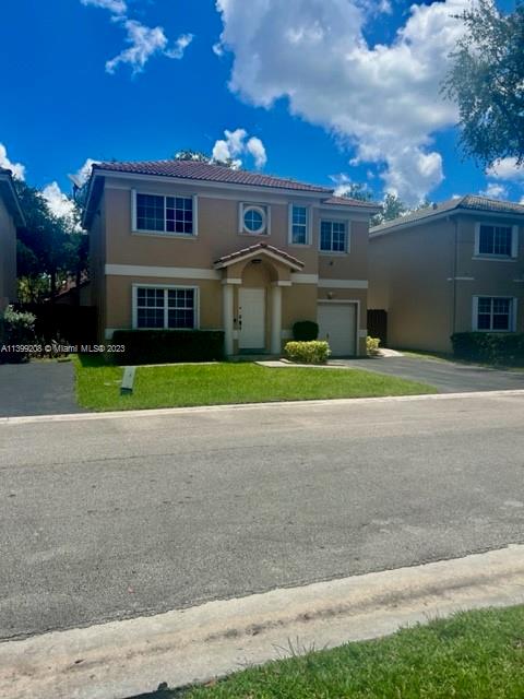 UPGRATED HOME IN WEST PLANTATION WITH A  DARK WOOD KITCHEN CABINETS & QUARTS COUNTER TOP & STAINLESS STEEL APPLIANCES, NEW CERAMIC TILE THRU OUT GROUND LEVEL AND LAMINATE FLOORS 2ND LEVEL. NEUTRAL COLOR WALLS. UPDATE BATHROOMS.BACKYARD FULLY FENCE WITH PAVERS. THE SECURITY SYSTEM IS OPTIONAL (TENANT WANTS IT WILL IT BE $65.00 PER MONTH ADDITIONAL TO THE RENT) ACCORDIAN SHUTTERS IN ALL WINDOWS. CREDIT MUST BE ABOVE 650. A+ SCHOOLS AND QUITE NEIBORHOOD.  TENANT MUST PROVIDED RENTERS INSURANCE UP TO $100k PAID IN FULL PRIOR MOVE IN. TENANT TO PAY SCREENING FEE $100.00 PER ADULT TO R1S1 REALTY. THIS HOME IS A MUST SEE!!