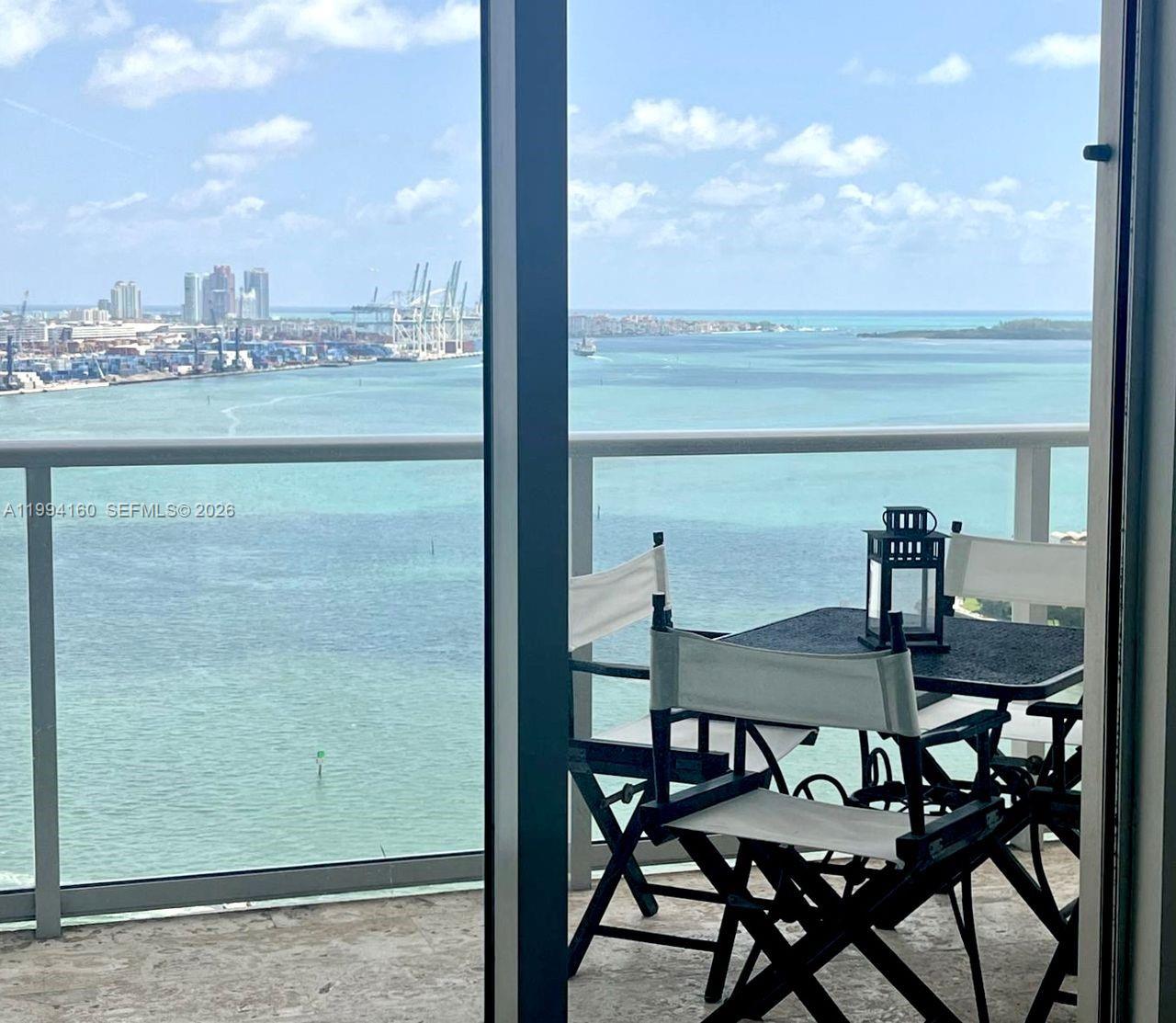 Do yourself a favor and experience this stunning waterfront retreat in person. From the moment you step inside, you are greeted by breathtaking water views, abundant natural light, and a serene ambiance—this is a place you’ll instantly want to call home. This beautifully appointed 2-bedroom, 2-bath residence features floor-to-ceiling windows that showcase spectacular vistas. The open-concept layout seamlessly blends the living, dining, and kitchen areas, creating the perfect space for both relaxed living and entertaining. The modern kitchen offers sleek appliances and ample counter space, new floor, and 2 special pantries. The guest bedroom is thoughtfully designed with a built-in Murphy bed, providing a stylish and space-saving solution for added flexibility, with its own walking closet. The terrace also has special floors. Ideally located just steps from Brickell and Brickell City Centre, this residence offers a sophisticated urban lifestyle and strong appeal for long-term rental, with a consistent tenant base of professionals. Internet and cables are included in the HOA. Everything you need is right at your doorstep. Just reduced.
Schedule your private showing today.