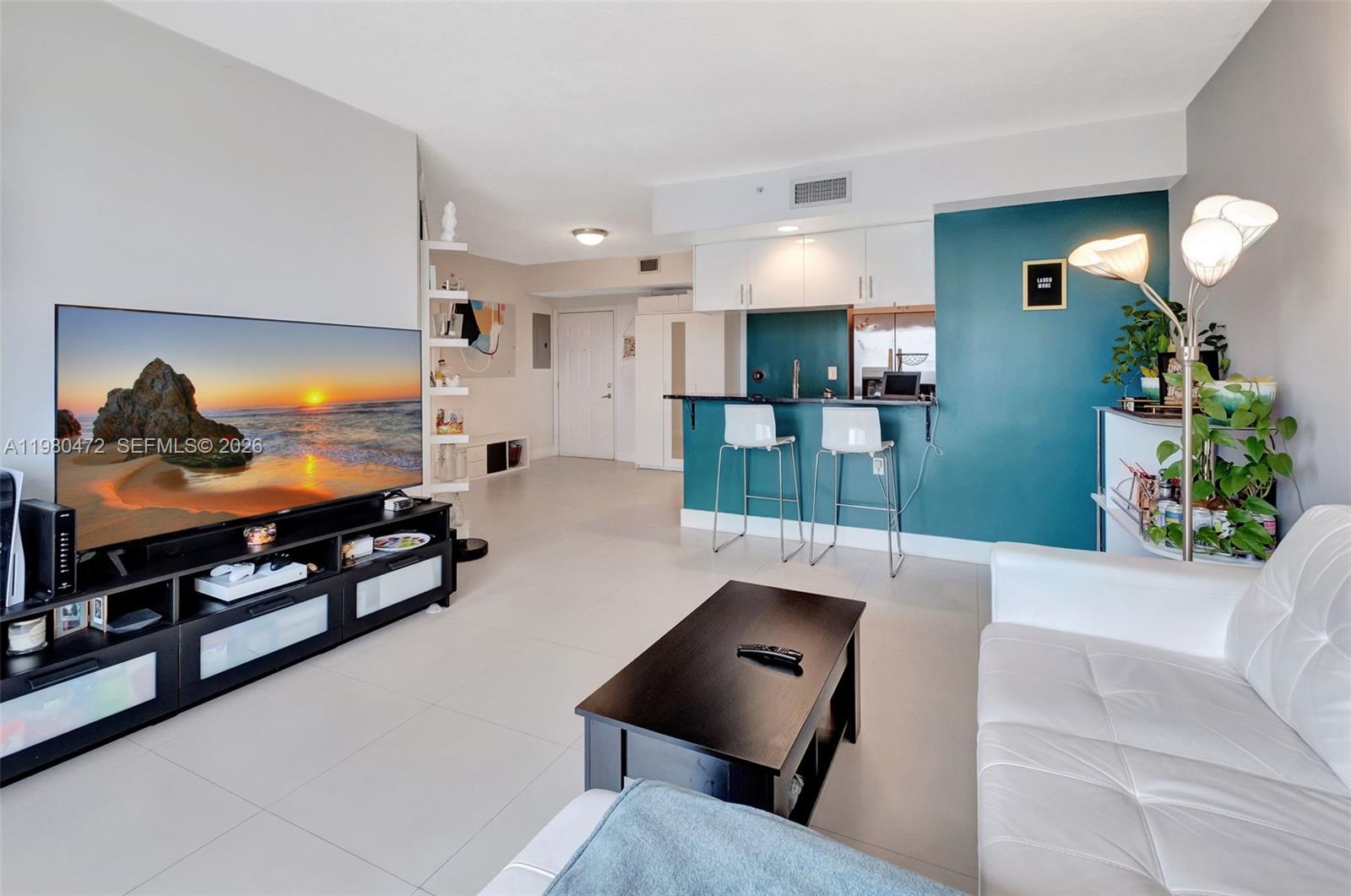 Experience luxury living in this beautifully renovated 1-bedroom, 1-bathroom penthouse located in the heart of Edgewater. This exquisite unit boasts modern finishes, an open-concept layout, and breathtaking city and bay views. Enjoy top-of-the-line appliances, custom cabinetry, and a spacious balcony perfect for entertaining or relaxing. Situated in a prime location, you’re just steps away from the best dining, shopping, and entertainment Miami has to offer. Don’t miss out on this rare opportunity to own a piece of paradise! Unit is tenant occupied until April 30th 2026. Please schedule with 24 hours notice. Special assessment in place for $203 monthly. Property can be financed through conventional with minimum downpayment.