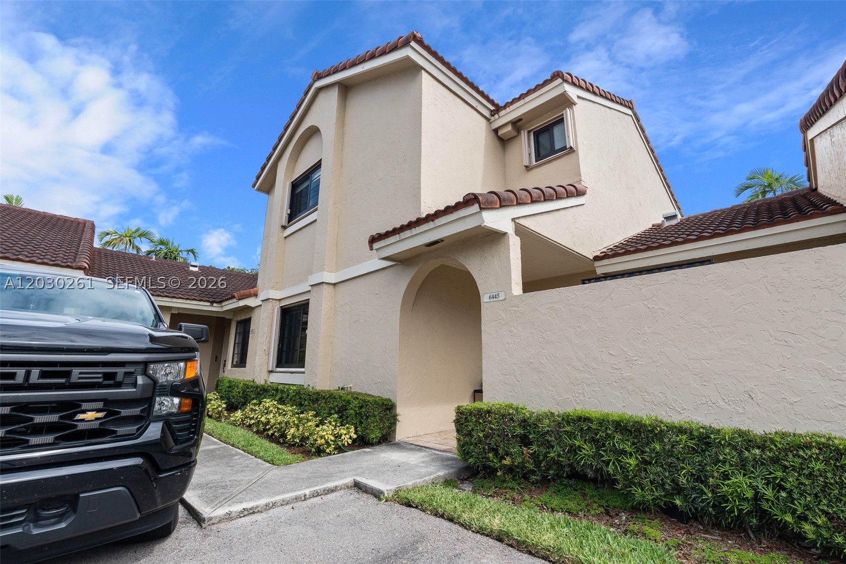 This beautiful lakefront townhouse is a gem in Village Homes at The Moors. It boasts 2 bedrooms and 2 baths plus a spacious loft now converted to 3rd bedroom with closet, which is also great for an office or guest room. Impact windows and doors keep you safe while letting in the view. Both bathrooms are remodeled, and all new kitchen has granite countertops and new appliances. Plus, inside and outside A/C units are new (2025), blackout window treatments in bedrooms, washer/dryer, new staircase railing, New patio hurrican proof cover along with new outdoor flooring. The living room also has a wall-to-wall custom wall unit. HOA covers roof and building exterior. Two assigned parking spots come with the place. HOA Includes, Internet and cable, security, landscaping, and 2 pools. As a Resident, you can enjoy perks like a clubhouse, pool, gym, tennis, pickleball, basketball, volleyball, and playground. All that, and it's super convenient to shops, dining, schools, and major roads. 

For showing, please call Ody at 305-216-2421