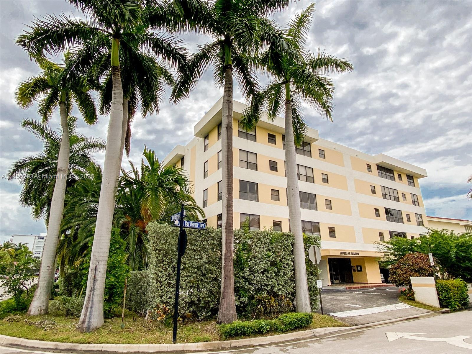DESIRABLE BAY HARBOR ISLANDS. Bright Large 900 Sq. ft. 1 Bed 1 1/2 Bath. Upgraded kitchen and bathrooms. Master Bathroom with shower, guest bathroom. Tile and carpet, crown molding, eat-in kitchen. Washer/Dryer on the same floor. SW Corner unit.  Only four units per floor. Covered parking space. Few minutes drive to the Beach, Bay Harbor, Bal Harbour and Surfside Shopping and Restaurants. Excellent schools. Centrally located between Miami and Fort Lauderdale Airports