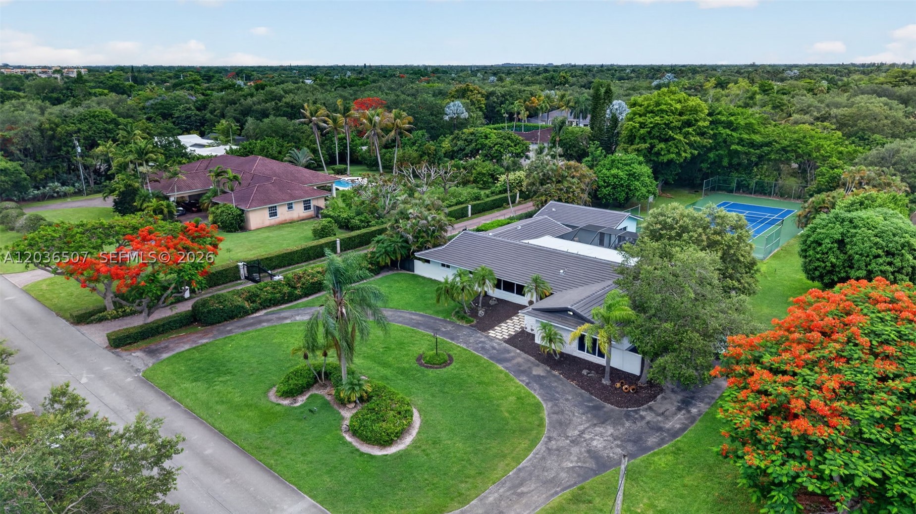 **Coming Soon** Welcome to 12180 SW 92 ave and your renovated 5 bed, 2.5 bath 2937 sq ft 1 story main house  w/ detached, 1 bed 1 bath 782 sq ft guest house in a resort style setting on almost a full acre w/ the newly redone pool (2023) w/ enclosure & ample covered entertaining space and redone Tennis & Pickleball court, & indoor sauna, wet bar & fireplace. All Impact doors and most windows, Brand New Tile Roof 2025. Have peace of mind with your whole house gas generator. Most of the house was renovated in 2017 including new porcelain tile floors throughout, kitchen and appliances (2017 – 2021), Baths Redone in 2023. The living areas are generous, the light is abundant and floorplan is versatile with the 5th bedroom. Surrounded by new construction homes in the $4m to $5m range. Nested between The Falls, Pinecrest, and Killian in one of South Miami’s premier neighborhoods, this prime location is minutes to upscale shopping, fine dining, Dadeland Mall, Baptist Hospital, top-rated schools and Rivera Prep, golf, parks, Coconut Grove, Coral Gables and University of Miami, Key Biscayne Beaches. Not in a flood zone, No HOA.