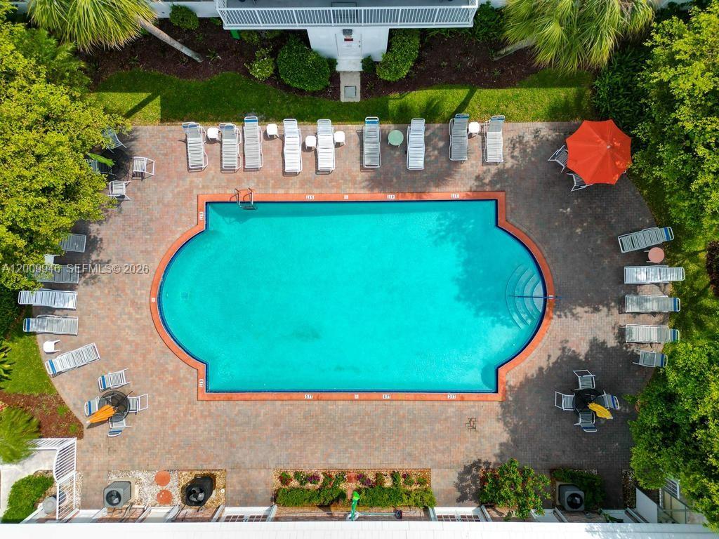 Discover this charming 2-bedroom, 2-bath apartment located less than 2 miles from the beach in desirable Pompano Beach. This well-maintained home is move-in ready, completely furnished, featuring a newer water heater and AC, comfortable living in a highly sought-after 55+ community. The property allows short-term rentals, making it a great opportunity for both personal use and investment. Conveniently located near shopping, dining, and major roadways, with easy access to the beach and surrounding attractions. Peaceful community setting with well-kept grounds. Enjoy an active adult community with resort-style amenities: heated pool, clubhouse, BBQ/picnic areas, library, and walking paths. Steps away from Publix, dining, salons, and shops. New roof, fresh interiors. This is an unbeatable opportunity for relocation or a Florida lifestyle upgrade—schedule a showing today!