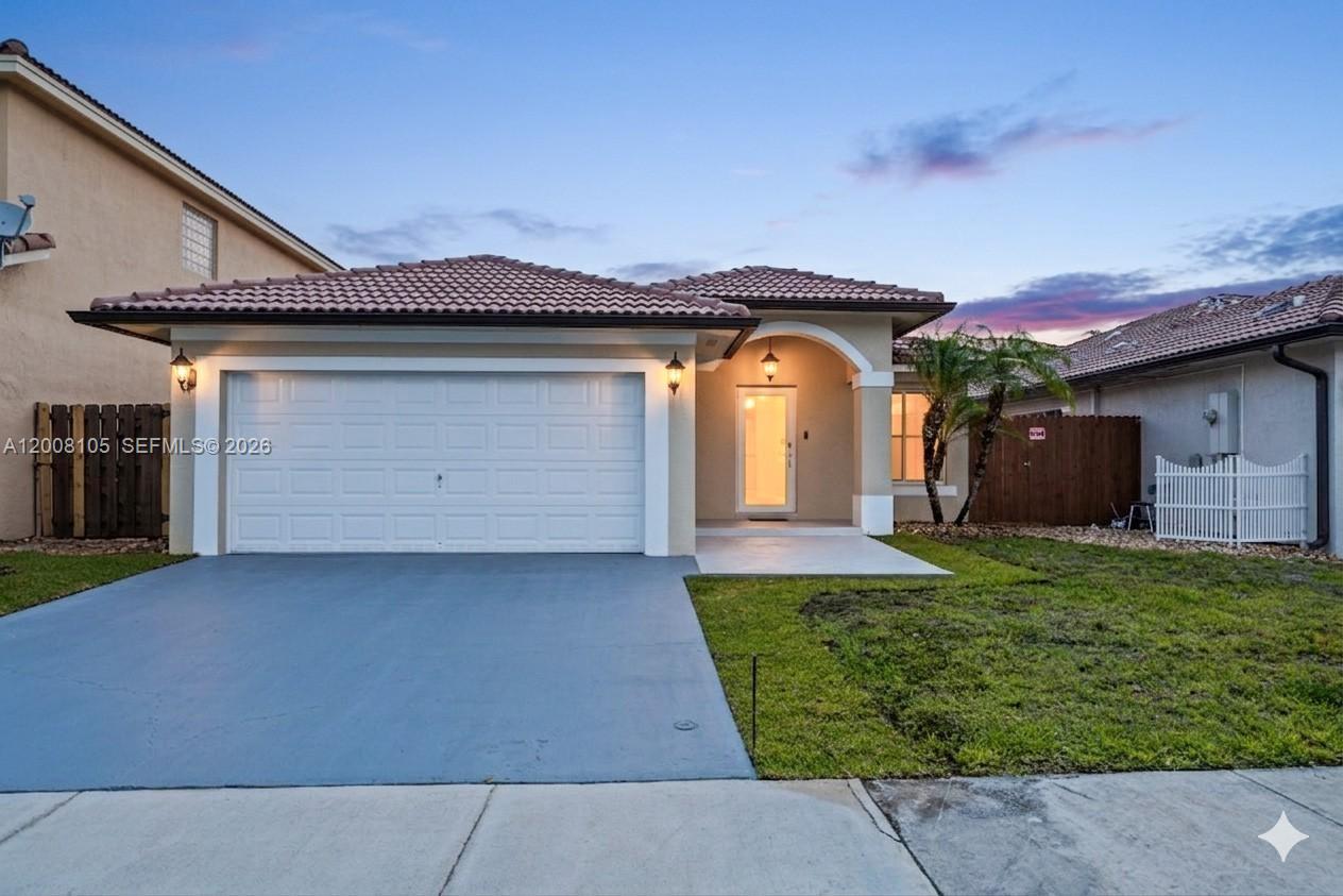 Stunning fully remodeled home in a highly desirable neighborhood! This beautiful property features high ceilings and abundant natural light, creating a bright and airy living space. A total of 1834 square feet! Enjoy upgraded tile flooring throughout, along with a brand-new kitchen and modernized bathrooms designed with style and functionality in mind. Recessed lighting adds a sleek, contemporary touch. Step outside to a private fenced yard—perfect for relaxing or entertaining. This move-in ready home is a must-see! Seller is offering closing cost assistance!