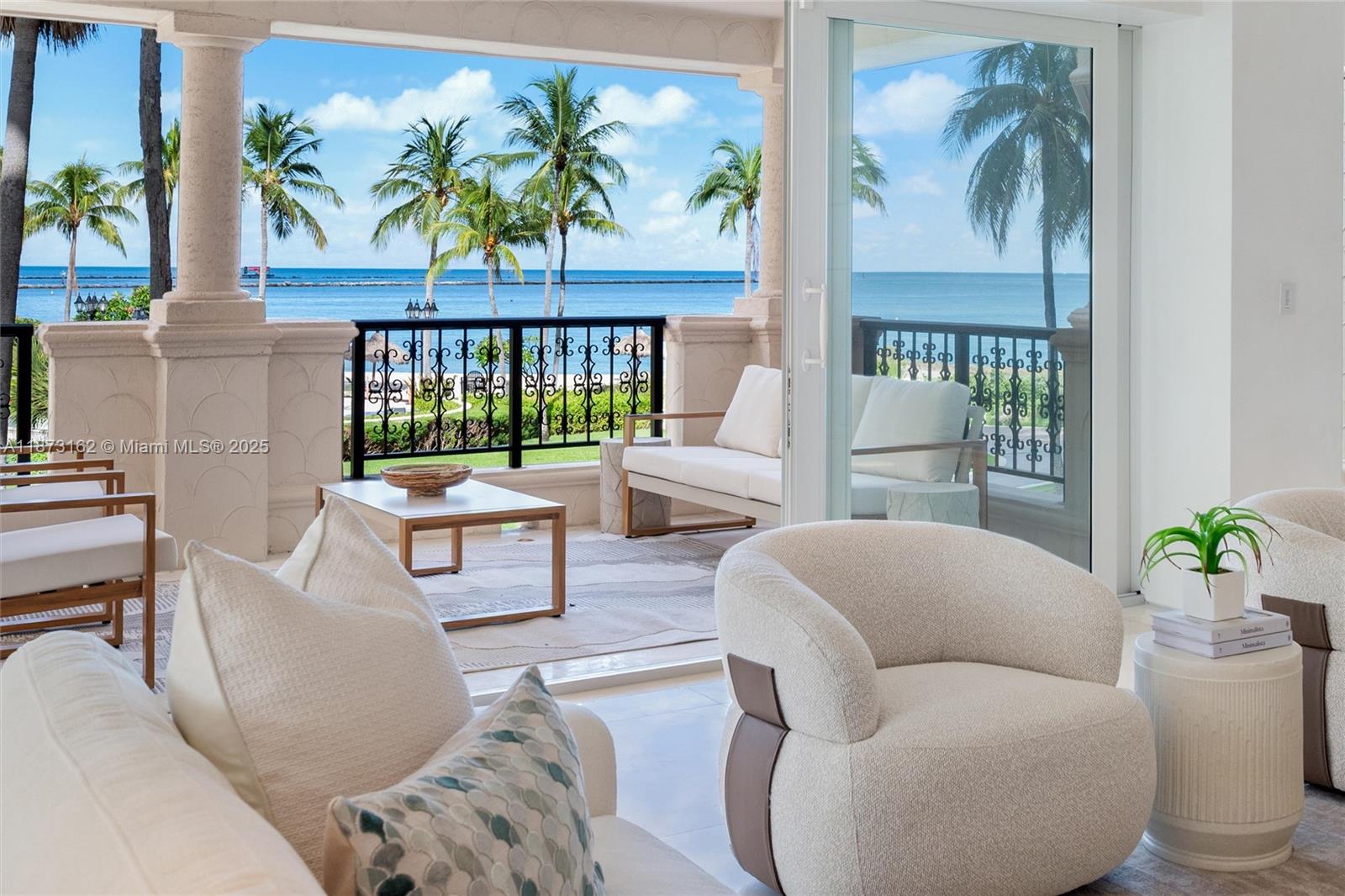 This stunning Oceanside unit on Fisher Island redefines luxury living at its finest. Completely renovated to perfection this masterpiece encompasses 3,580 sq. ft. interior, 4 bedrooms + den, 3.5 baths, wrap-around terraces overlooking the ocean, beach & golf course. Professionally designed with an open layout, state-of-the-art eat-in kitchen w/waterfall Calacatta marble counters & walls, Gaggenau & Miele appliances, separate kitchen room, custom built-in/entertainment, Osso marble floors and English oak wood floors, Venetian plastered walls, principal spa shower with chromo-light therapy, Ornare closets, impact glass doors, Savant Smart Home, Automation system w/audio-visual Stealth and more features. Live the Fisher Island lifestyle in this exceptional unit!
