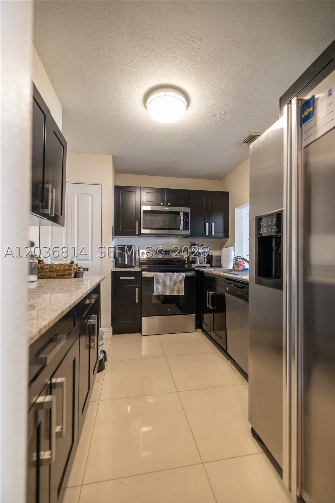 TAMIAMI LAKES TOWNHOUSES - Residential Lease