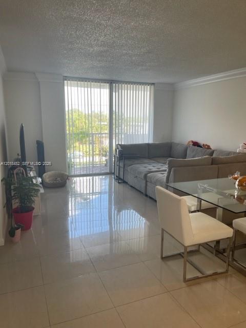 Beautiful condo in North Miami! Located on a quiet tree lined street but minutes from everything including shops, supermarkets, restaurants, beaches and more! Unit is in great condition with tile floors, updated kitchen & baths, new a/c unit, spacious rooms and nice view from the balcony. Service/Emotional support animals only.  Can be RENTED right away!