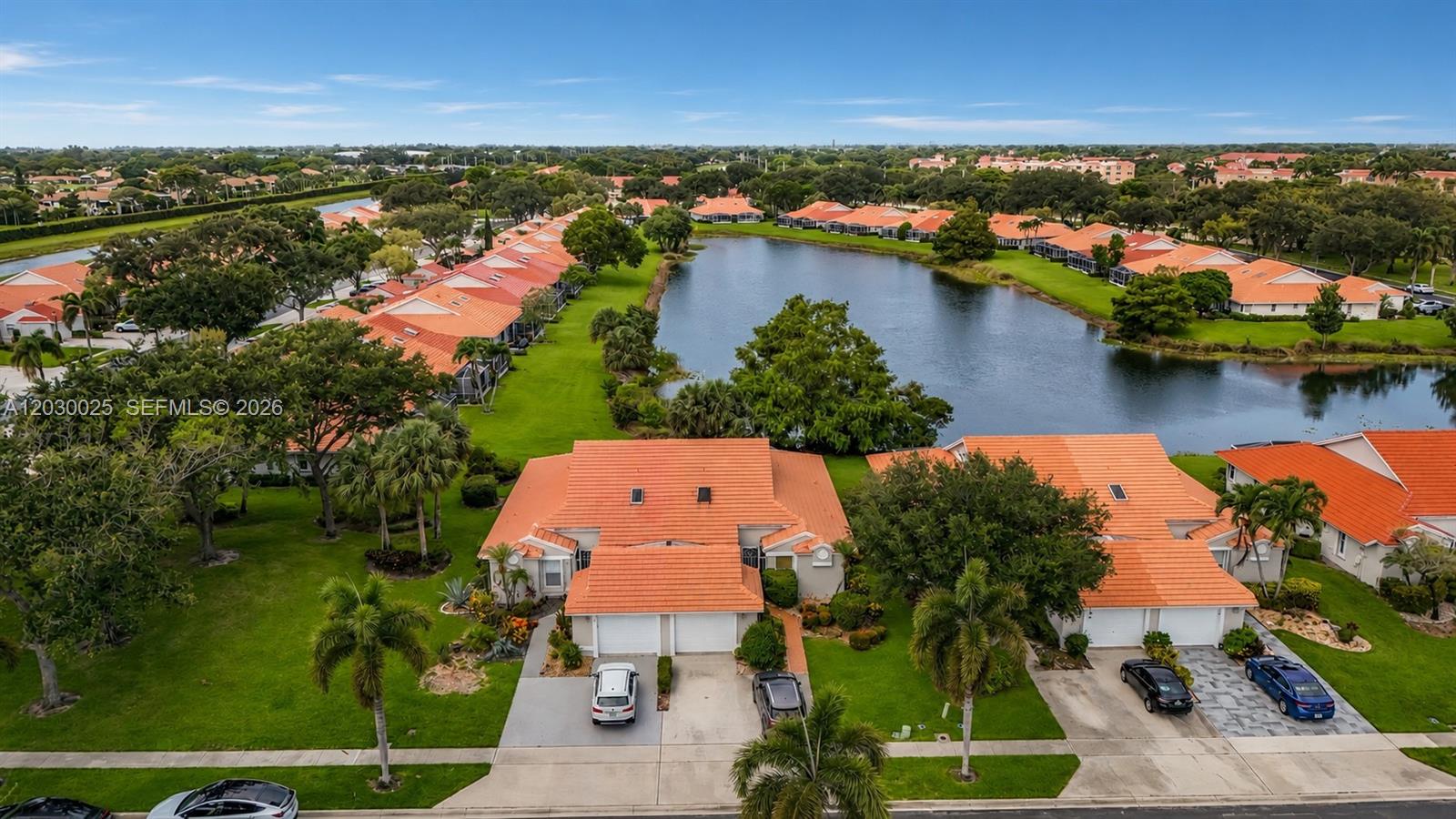 Welcome to Royal Landing at Coral Lakes, a sought-after 55+ community known for its vibrant lifestyle and exceptional amenities. This lakefront home with vaulted ceilings offers 2 Bedrooms/2 Bathrooms plus a versatile den featuring a built-in Murphy bed and potential to convert into a 3rd bedroom. Enjoy water views from the screened patio, the perfect setting for morning coffee/relaxation. Updates include a newer A/C (2023), water heater (2017), and newer washer & dryer. This residence provides an excellent opportunity for a new owner to add their personal style and updates. Set within a beautifully landscaped 580-acre community with 15 scenic lakes, Coral Lakes offers an impressive resort-style lifestyle centered around its recently renovated 72,000-square-foot clubhouse. Residents enjoy an indoor Olympic-size pool, outdoor resort pool, fitness center, steam rooms, saunas, hot tubs, card rooms, & a performing arts theater hosting concerts, shows, lectures, & community events. Outdoor enthusiasts will appreciate 10 tennis courts, 6 pickleball courts, basketball and handball courts, along with a full calendar of social clubs and activities. The community café provides convenient dining & catering options. This is your opportunity to enjoy the active South Florida lifestyle in one of Boynton Beach's premier active adult communities.