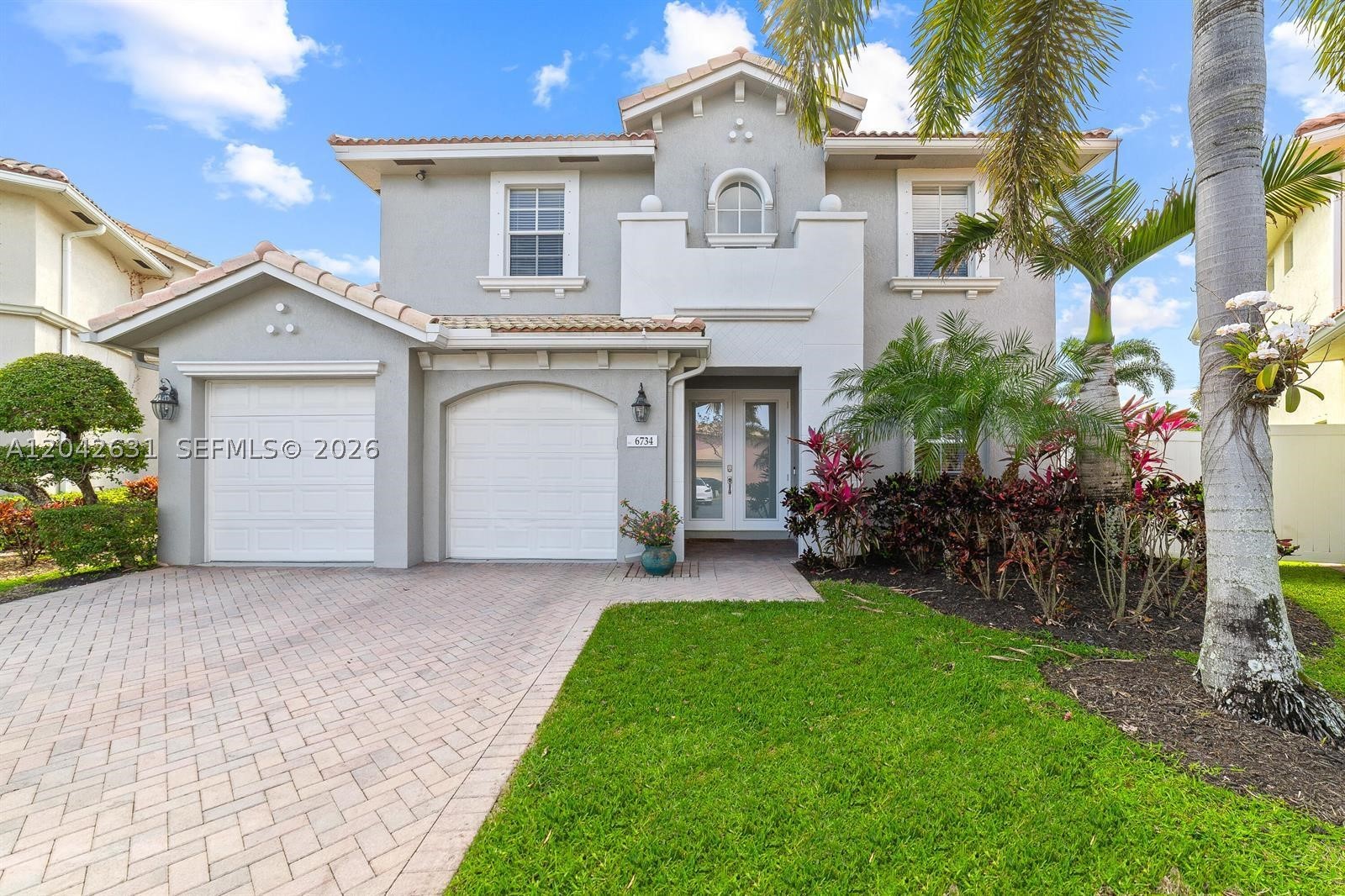 Lakefront living in the gate community of Briar Bay! Situated on premium cul-de-sac lot, this spacious 4- bedroom, 4-bath home offers approximately 3,400 sq ft of living space, stunning water views, and an oversized backyard with room for a custom pool. 

The flexible floor plan features a rare second primary suite complete with a spa-style bathroom, jacuzzi tub and separate shower. Recent updates include a newer AC (2022) and water heater (2025). Conveniently located near shopping, dining, schools, and major highways. 

Don't miss the opportunity to own one of Briar Bay's premier lakefront properties.