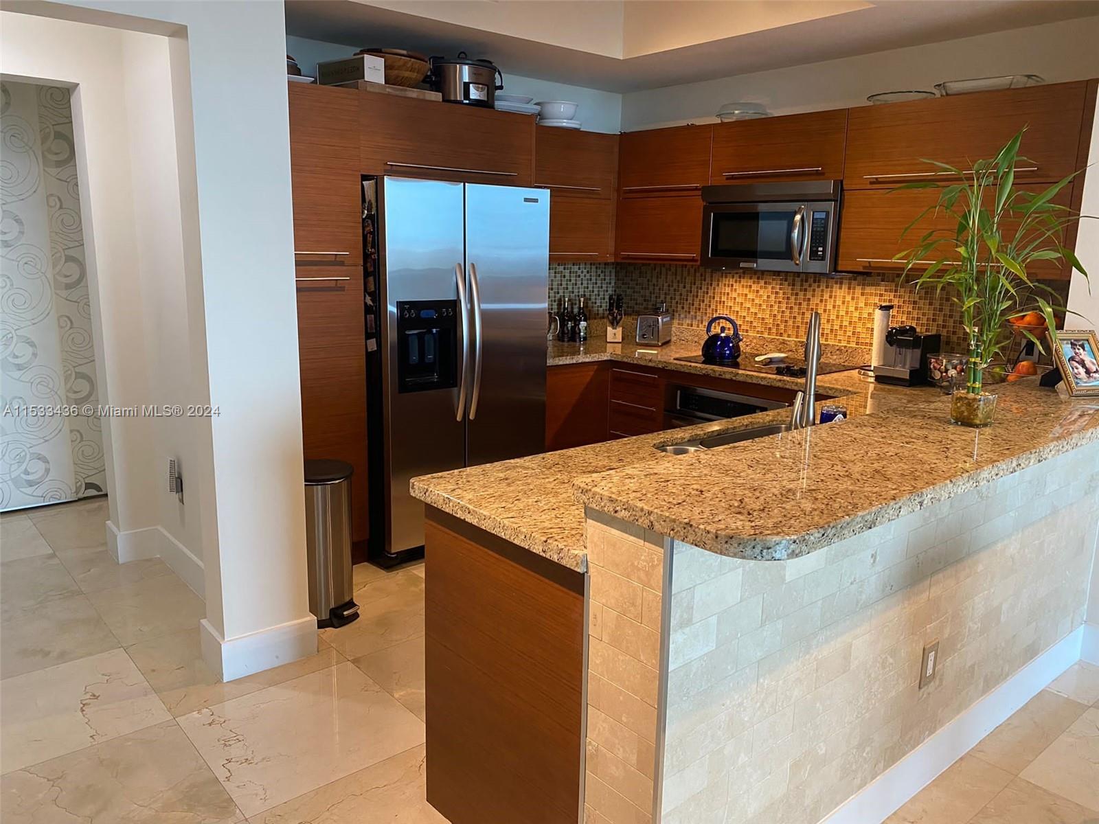 TAO SAWGRASS CONDOMINIUM - Residential Lease