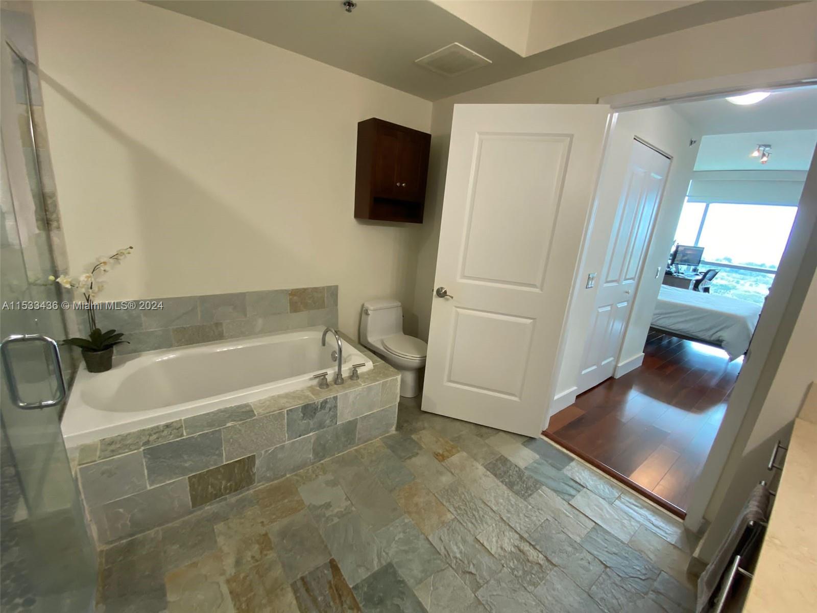TAO SAWGRASS CONDOMINIUM - Residential Lease