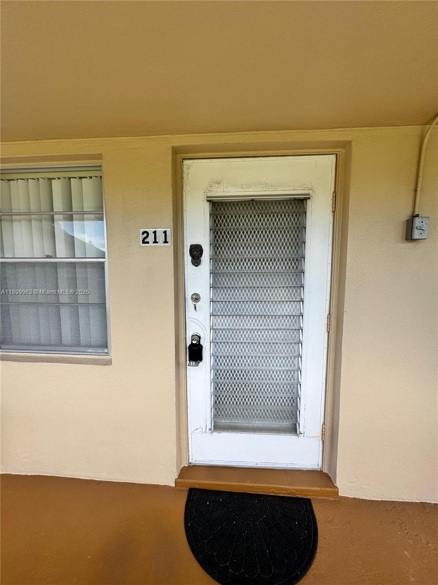 Gated Community Stunning one bedroom condo tile & carpet. 2 fans Community has a clubroom for entertainment, indoor / outdoor pools, tennis courts, courtesy bus service, medical facilities, a beauty shop, and more. Conveniently located near restaurants, shopping and more. 55+ adult community.