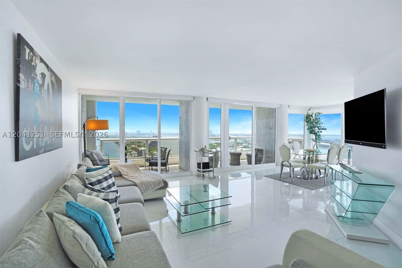 Spectacular 3 Bedroom Phenthouse w/two bath this is ultimate buy, enjoying stunning panoramic water views leaving you in awe. Unit comes completely furnished, turn key. Just 3 miles from South Beach yet feeling the energy of Downtown Miami. This luxury PH rivals all other competition in this price range in the area with the amenities of the Double Tree shared by the Grand residence.