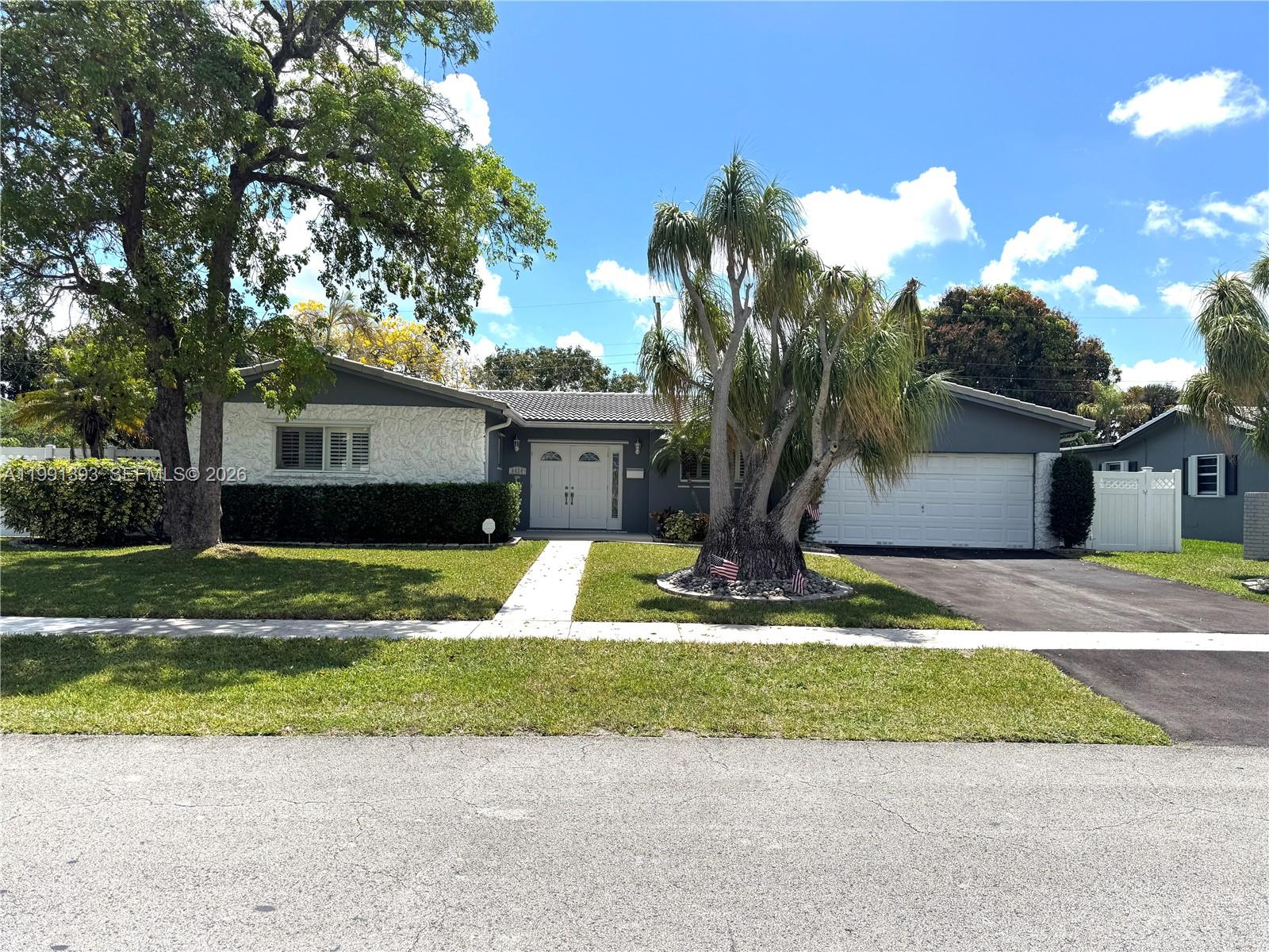 Spacious 4 bedroom, 2 bathroom gem, impeccably maintained and ready for move-in is Ideal for families. Nestled in the quiet and centrally located enclave of South Creek, close to parks, area schools, the Turnpike and I-95. Recently renovated bathrooms, a florida room big enough for a pool table, spacious screened-in porch, resurfaced pool with water feature. 2 car garage. Ready to show! Will sell fast. Call for an appointment today.
