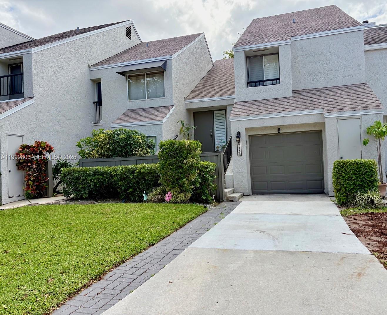 Stunning fully renovated 3-bedroom, 2.5 bath townhome with a garage attached, Porcelain large format flooring, Plantation Shutters, Custom Closets in Every Bedroom. Open-Concept Living & Dinning Areas ; in  the heart of Boca Raton (Via Verde). Features a bright open plan floors with a high-end stainless steel appliances, and luxury tile flooring throughout. The Community is located minutes from the pristine beaches, Boca Town Center and diners.The fully renovated, chef-inspired Kitchen is appointed with premium upgrades and contemporary finishes, while each bathroom has been tastefully redesigned to reflect a refined, modern aesthetic. The guest bathroom further enhances the home's appeal with a luxurious jacuzzi tub. Exterior & community , private 1 Car- Garage + 2 car driveway, Low  HOA Fees Includes maintenance, pool and insurance, Quiet, family- Friendly Community, Zoned for Top-Rated A+ Schools, Move-in Ready Condition.