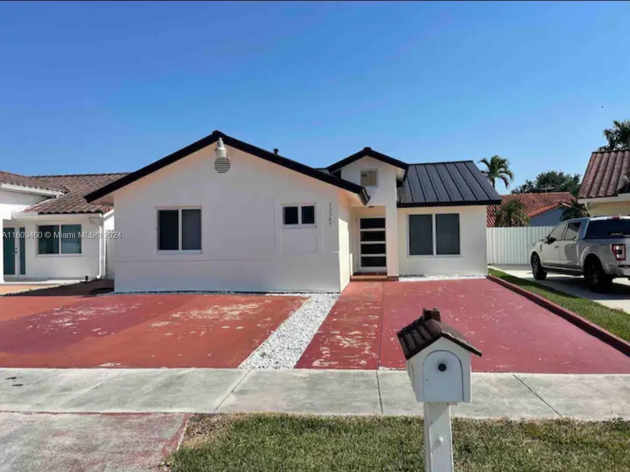 THIS HOME IS A TRUE GEM.AS YOU WALK IN NO DOUBT LOVE AT FIRST SIGHT WITH  OPEN CONCEPT FOR PERFECT INTERACTING NO MATTER WHERE YOUR AT.CONTEMPORARY FEEL WHILE YOUR IN TOTALLY REDONE KITCHEN WITH CONVENIENT LONG ISLAND WHERE FAMILY AND FRIENDS FAVORITE HANG OUT. SS APPLIANCES BEAUTIFUL WHITER QUARTZ COUNTER TOPS THROUGHOUT KITCHEN.3 NICE SIZE ROOMS.BACK PATIO FOR SUNDAY BBQS.FAMILY SAFETY IS IMPORTANT THEREFORE YOU COUNT ON ALL IMPACT WINDOWS AND IMPACT DOOR THROUGHOUT HOME AND NEW METAL ROOF WHICH IS FIRE RESISTANT,ENERGY EFFICIENT AND ENVIRONMENTALLY FRIENDLY.THIS HOME IS A KEEPER.