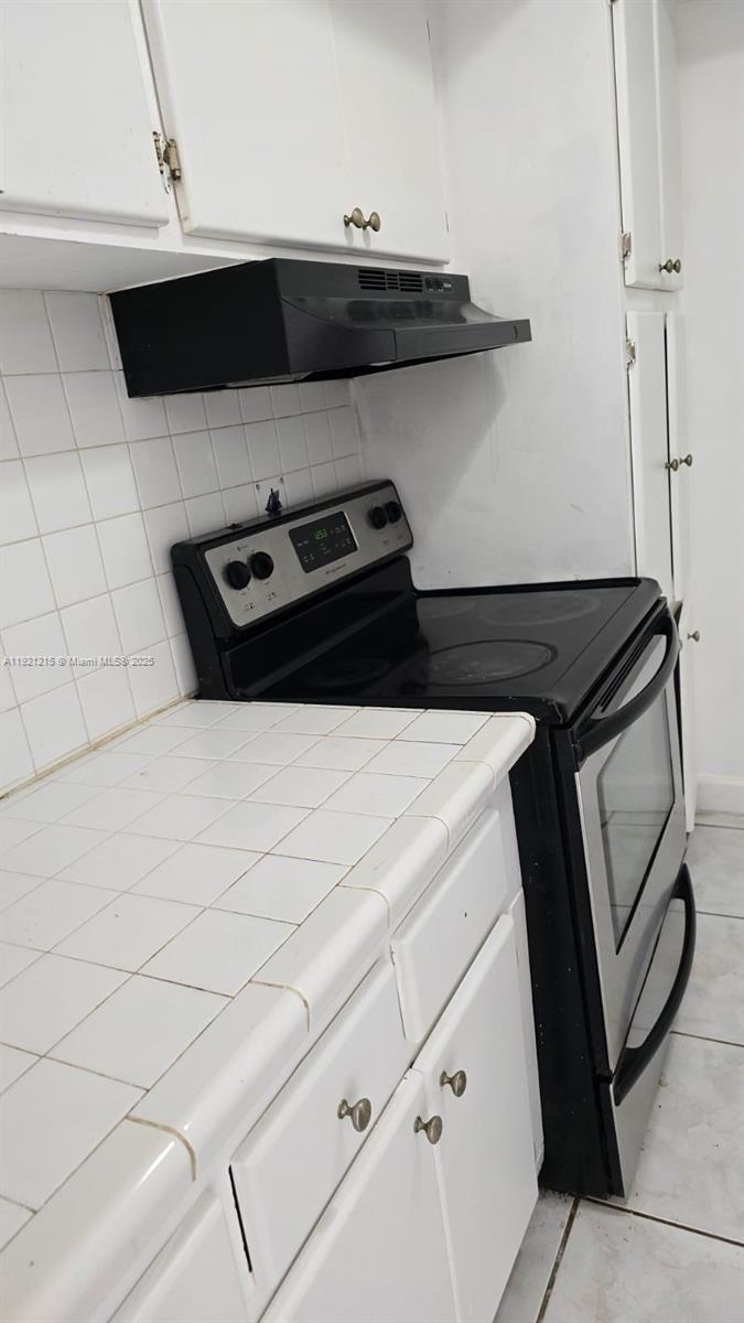 SUTTON HOUSE CONDO - Residential