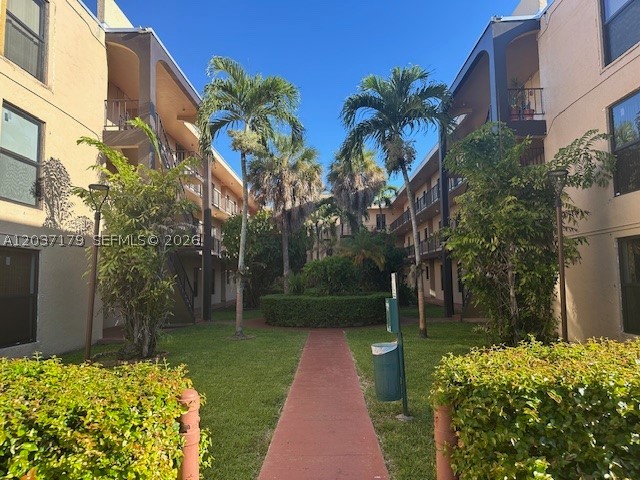 Spacious & centrally located condo in a high-demand area. Leased (tenant in place) until 8-31-26 at $2,650.00 monthly. Renovated condo with large back yard. 3 bedrooms & 2 full bathrooms, on first floor. This bright & airy unit has a clean & inviting interior with tiled floor through-out. Granite countertops & Stainless Steel Appliances in kitchen. Updated bathrooms. Large fenced back yard with storage. Building Laundry facility on first floor next to unit. Condo is located in the heart of Sweetwater, just minutes from FIU, major expressways, & public transit. Enjoy the convenience of walking to nearby shopping centers, dining, & everyday essentials. Building upgrades include a new roof and impact-resistant windows
