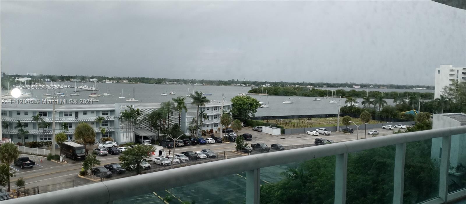 Tranquil views of Biscayne Bay and the islands of Normandy Shores and North Bay Village. High floor with private balcony. Bright and sunny in the morning with a refreshing breeze all day long. Huge balcony provides outdoor living space ideal for peaceful escapes or entertaining. Ideal for evenings dinners or just to lounge and enjoy the night views and fresh air. Split floor plan. W/D in unit. Two resort-style pool decks, first class gym, sauna and concierge services through the valet staff . Unit comes with 1 assigned, 1 valet parking. Both are covered/secured the garage. Stainless steel appliances, impact glass windows, large walk-in closets in both bedrooms . Guest parking is free. 24-hr security.