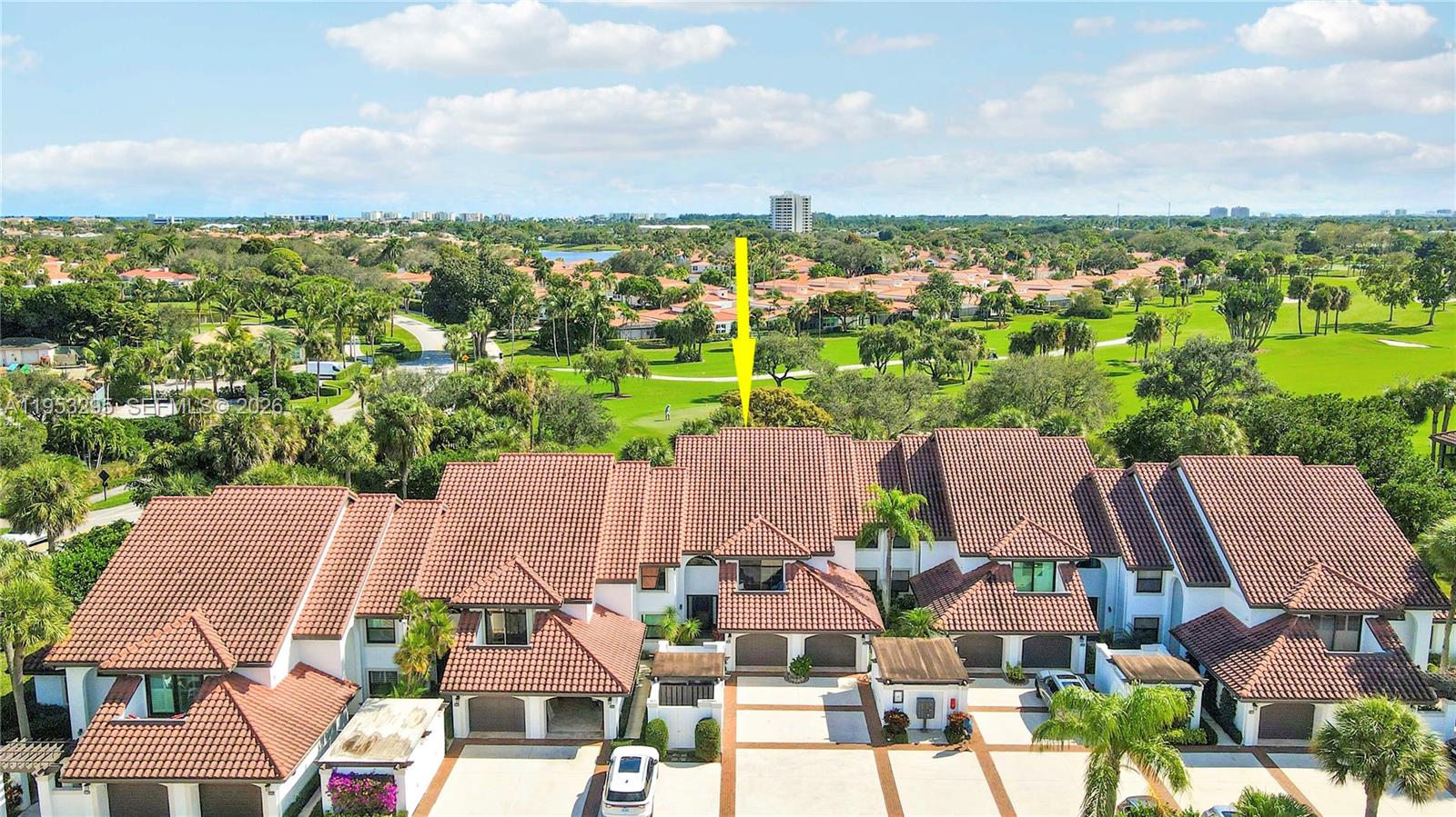 This sought after Second Floor 3 bedroom 2 bath unit in Traders Crossing S in Jonathans Landing has been nicely updated and has wonderful views of the golf course as well as the tropical landscape. Hardwood and Luxury Vinyl floors throughout coupled with the Vaulted Ceilings and Open Floor Plan make this sun filled unit a unique and desirable opportunity for the buyer looking for something special. Bright and Inviting Eat In Kitchen has newer appliances and beautiful Counter Tops. The Large Primary suite offers a well laid out Primary Bath with separate areas for privacy, large walk-in closet, and a wonderful private balcony off the Primary looking over the golf course. 2 Additional Guest Bedrooms are generously sized to accommodate a King or 2 Full/Twin Beds. One of the bedrooms can also serve as a Den/Family room with a pull out sofa instead of a bed since it has a wet bar and another large private balcony on the Back/West Side of the unit. The entry level features a warm and welcoming 2 story foyer with a wrapped staircase to the Main Level of Living as well as a storage/coat closet. The oversized One Car Garage has plenty of storage area and conveniently connects directly to the Foyer. A Golf Cart Storage Garage is directly out the Front Door and Adjacent to the garage. Additional 2 cars can fit Tandem in the Driveway leading into the garage as well as guest parking in the complex. Community Pool and Restroom Facilities are a very short walk just across the street.