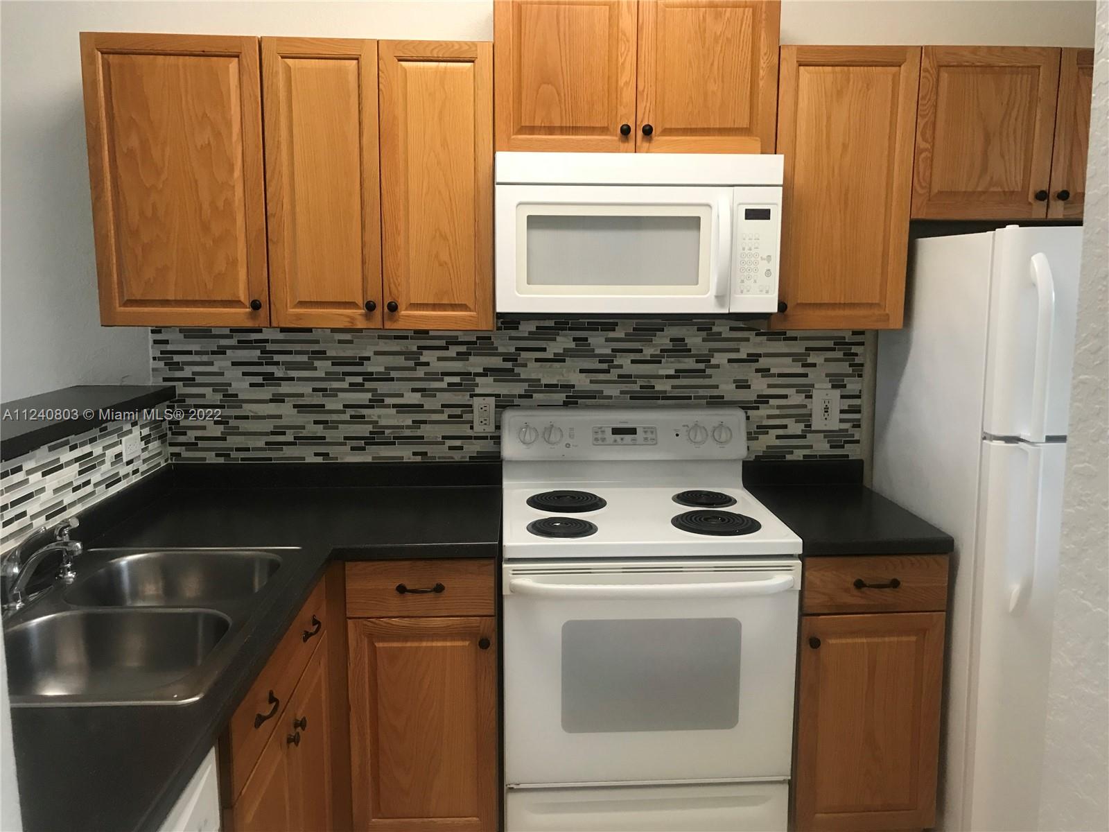 GARDENS OF SUNRISE CONDO - Residential Lease