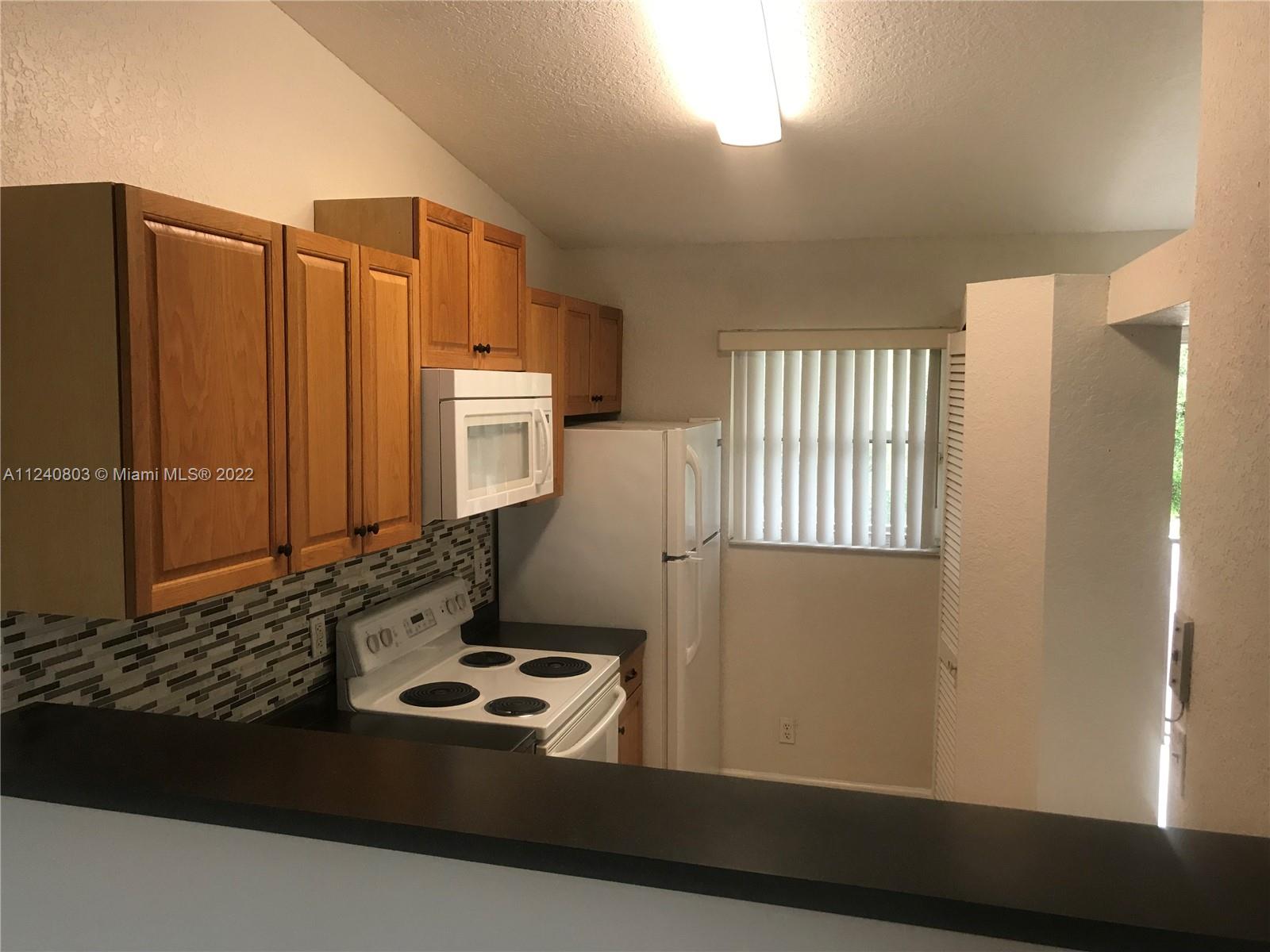 GARDENS OF SUNRISE CONDO - Residential Lease