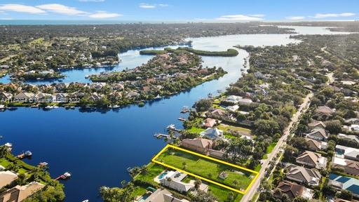 ESTATE PARCEL ( .65 AC. ) LOCATED ON THE HISTORICAL LOXAHATCHEE RIVER, LOCATED ON THE MOST DESIREABLE AREA ON THE RIVER WHICH LENDS ITSELF TO PRIVACY, NATURE AND ACCESS TO THE JUPITER INLET WITHIN MINUTES. SPACIOUS VIEWS WITH BREATH TAKING SCENERY.
