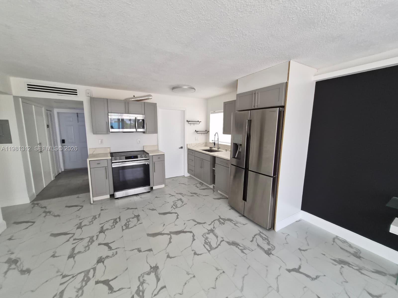 OWNER MOTIVATED ! ALL NEW - Large 2 bedroom, 2 bath, completely remodeled with walking closet, large screened balcony, awesome location, close to major highways, Walmart, Aventura Mall, Aventura and Sunny Isles. Easy access for public transportation. This condo is great for investors. its already rented for 12 months and tenants can stay.  Very quiet building, gated and secure.

CASH BUYERS ONLY