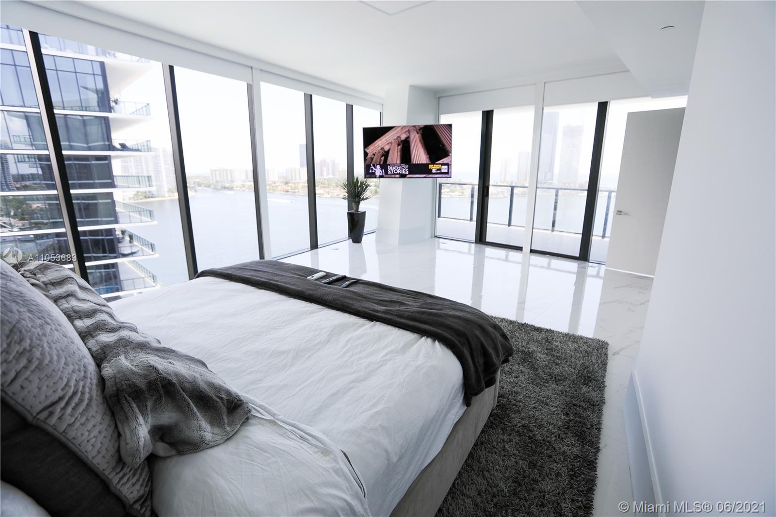 Lowest priced per square foot in Privé. Stunning corner unit with 270-degree views. 4, 125 sq. ft (with Terrace). 4 bedroom 5 1/2 bathroom apartment in the exclusive new development located on Prive Island in Aventura. Electronic blinds across. Enjoy the breathtaking views of the ocean, sandy beaches, and city lights coupled with elite accommodations, world-class service, and five-star amenities including cigar lounge with private humidors, private wine storage cellars, library, billiard room, media room, business center, restaurant, kid's playground, gym, spa, tennis courts, full-service beach, and pool. Residents of all ages and interests are sure to enjoy the island lifestyle which is centrally located near wonderful restaurants, superb shopping, and top-rated private / public schools.