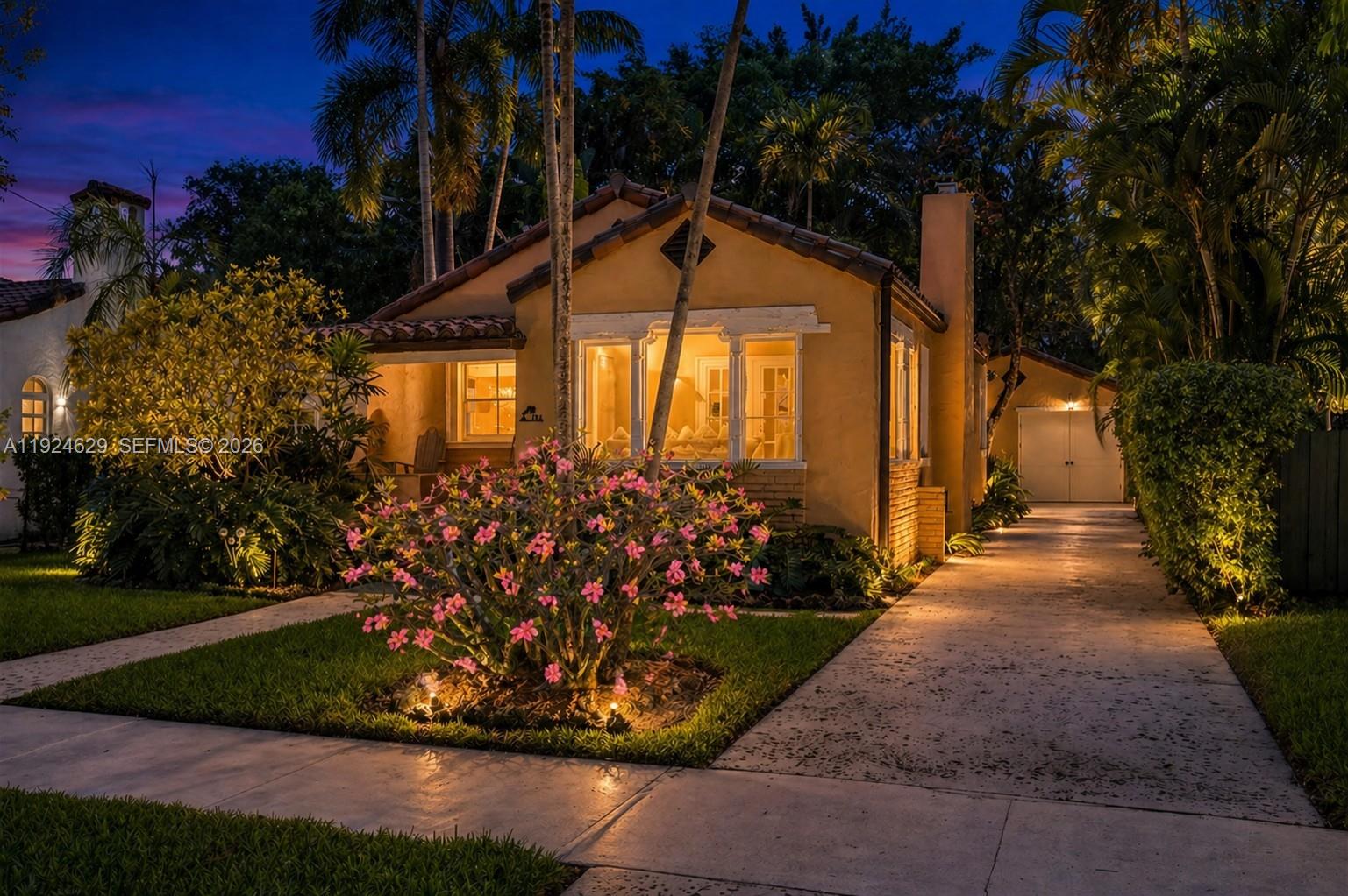 Step into the warmth and timeless charm of this lovingly restored 1926 Mediterranean Revival home in the heart of Miami Shores. Completely turnkey and full of character, it’s the perfect lock-and-leave retreat for anyone craving comfort, convenience, and low-maintenance living.
This delightful 2-bedroom, 1-bath haven features glowing original wood floors, custom millwork, a charming Pecky cypress screened-in porch, and a true wood-burning fireplace—ideal for cozy evenings at home. The modern kitchen, with its stainless-steel appliances, blends seamlessly with the home’s historic soul.
Outside, a lush and private garden offers a peaceful escape, while inside, smart-home tech and updated systems provide effortless ease. The 400 sq. ft. air-conditioned garage is perfect for a home office, gym, or creative studio.
Stroll to neighborhood cafés, shops, and parks. Now priced $50K below asking—a rare opportunity to own a warm, beautifully restored classic at exceptional value.  Images may be virtually staged and/or digitally enhanced (furniture, colors, fixtures, landscaping) for illustrative purposes only.