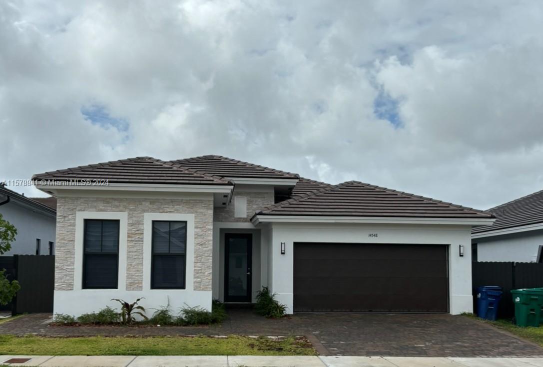 BEAUTIFUL NEW CONSTRUCTION MULTIGENERATION HOME. 4 Bedrooms and 3 Bath. In Law Suite with separate A/C and private entrance, kitchen,stainless steel refrigerator, Sink, washer and dryer include. Spacious master room and walk-in closets. Style Modern integrated. Big back yard ideal for pool construction. !NO ASSOCIATION!: No Fees, no Rules... VERY QUIET COMMUNITY. FAST ACCESS TO 8 ST. AND 26 ST. (CORAL WAY) To close to shopping center, publix, fresco. Baptist  Emergency Care very close.